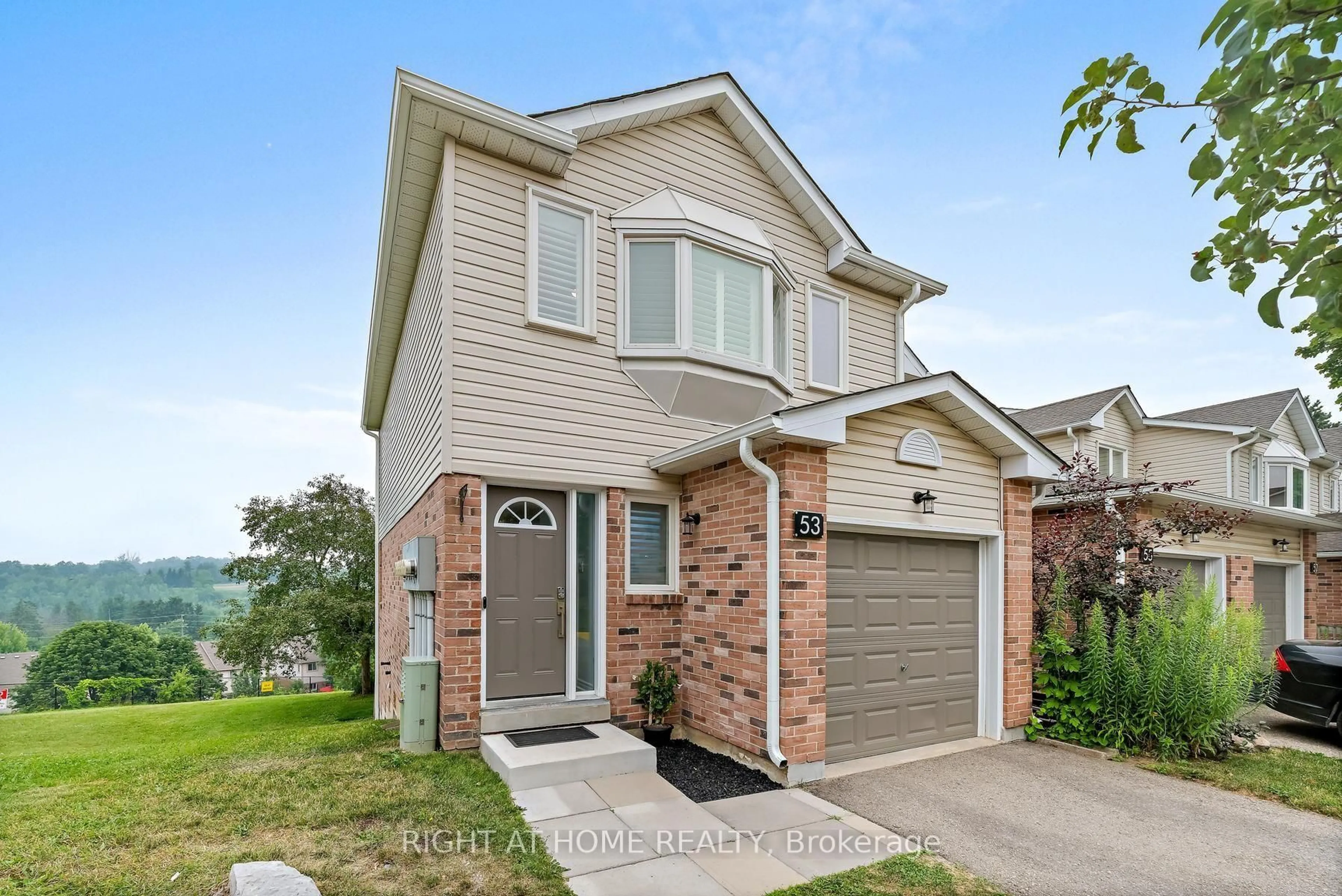 Home with brick exterior material, street for 53 Corey Circ, Halton Hills Ontario L7G 5L7