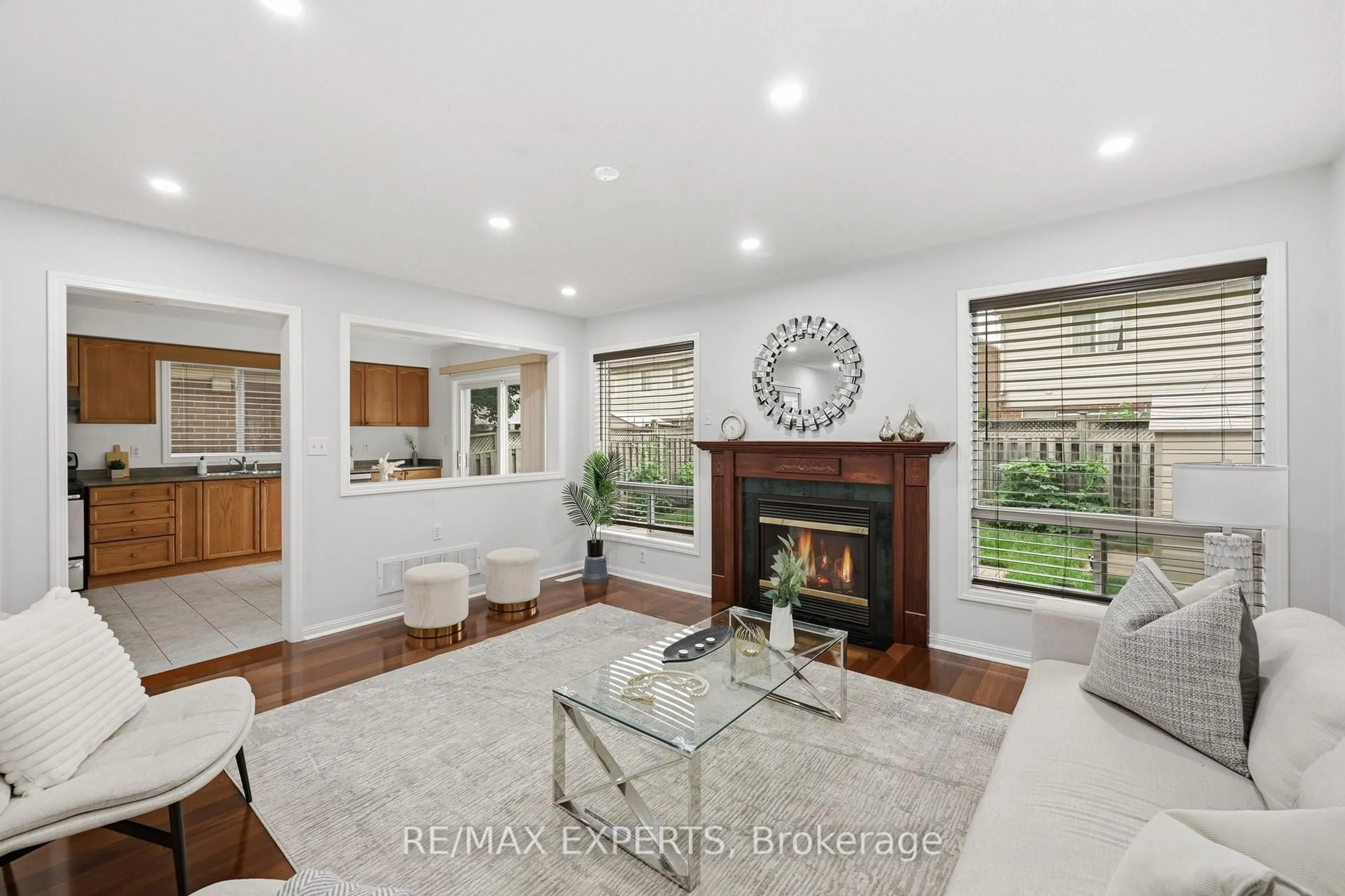 Living room with furniture, ceramic/tile floor for 554 Caverhill Cres, Milton Ontario L9T 5K6