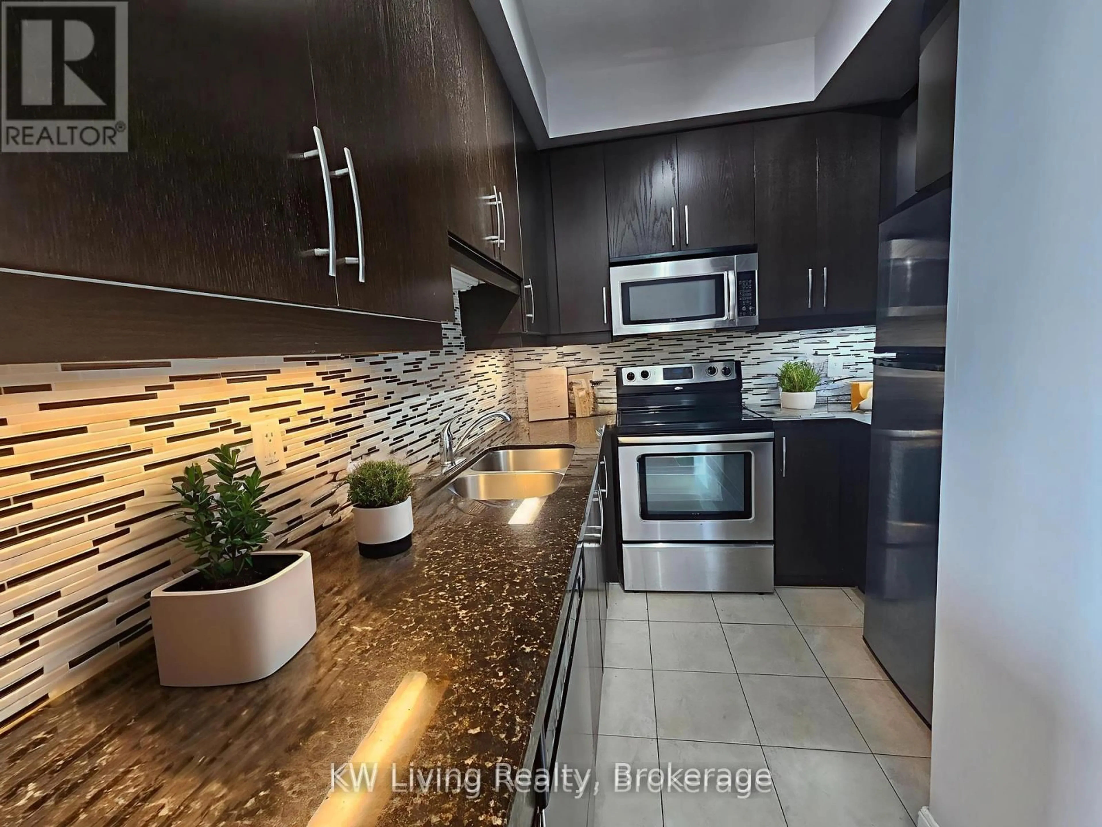 Open concept kitchen, ceramic/tile floor for 60 Absolute Ave #4804, Mississauga Ontario L4Z 0A9