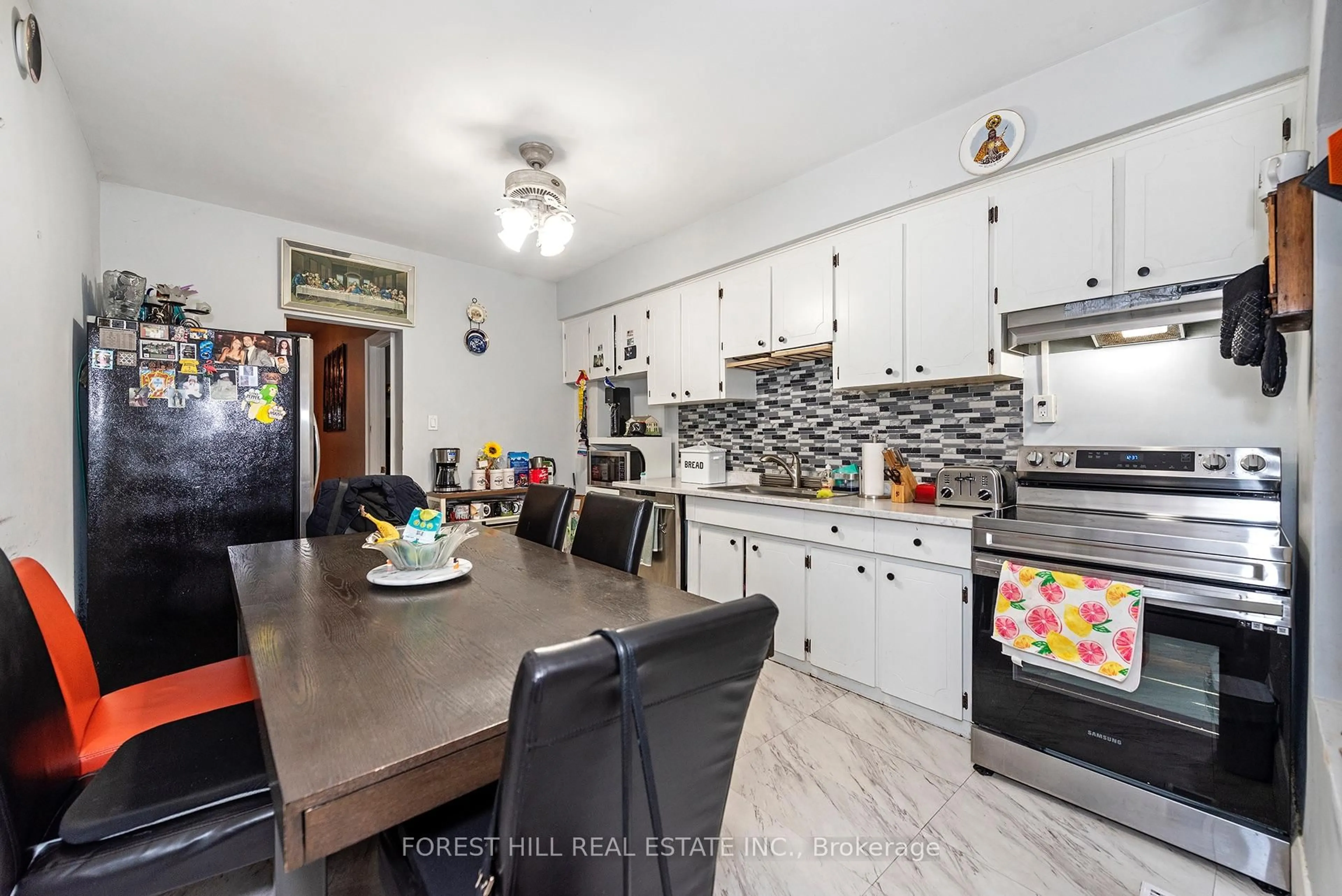 Open concept kitchen, ceramic/tile floor for 413 Westmoreland Ave, Toronto Ontario M6H 3A6