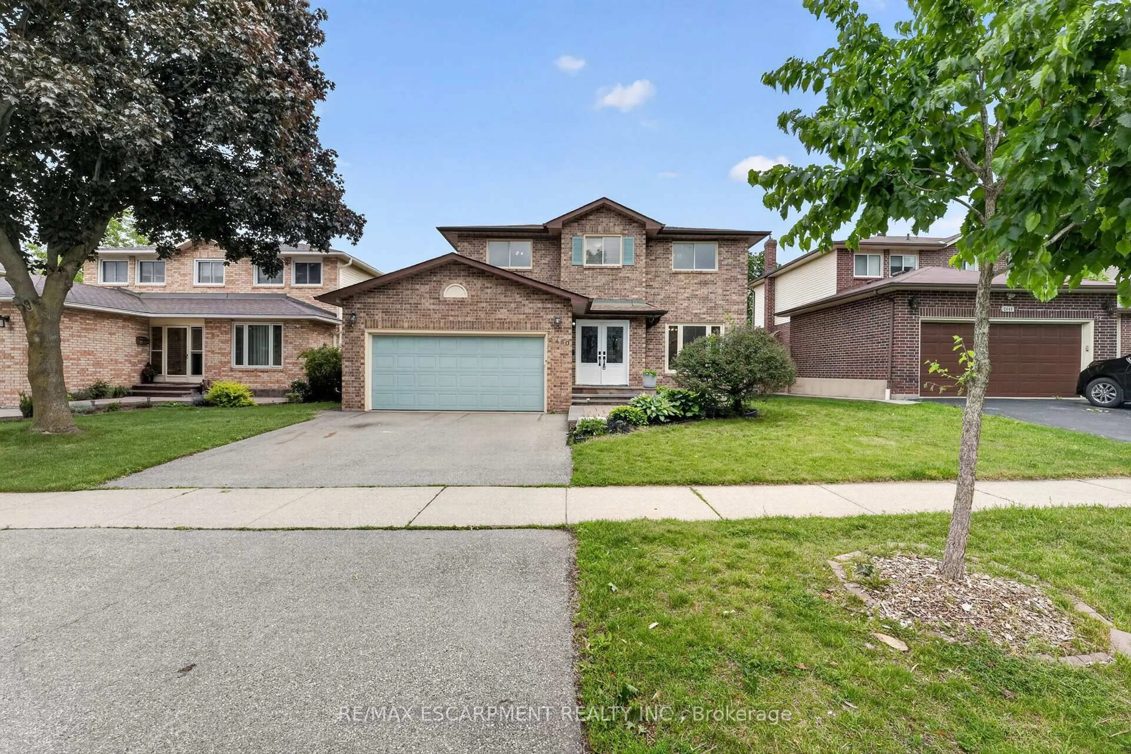 Home with brick exterior material, street for 2450 Overton Dr, Burlington Ontario L7P 4B5
