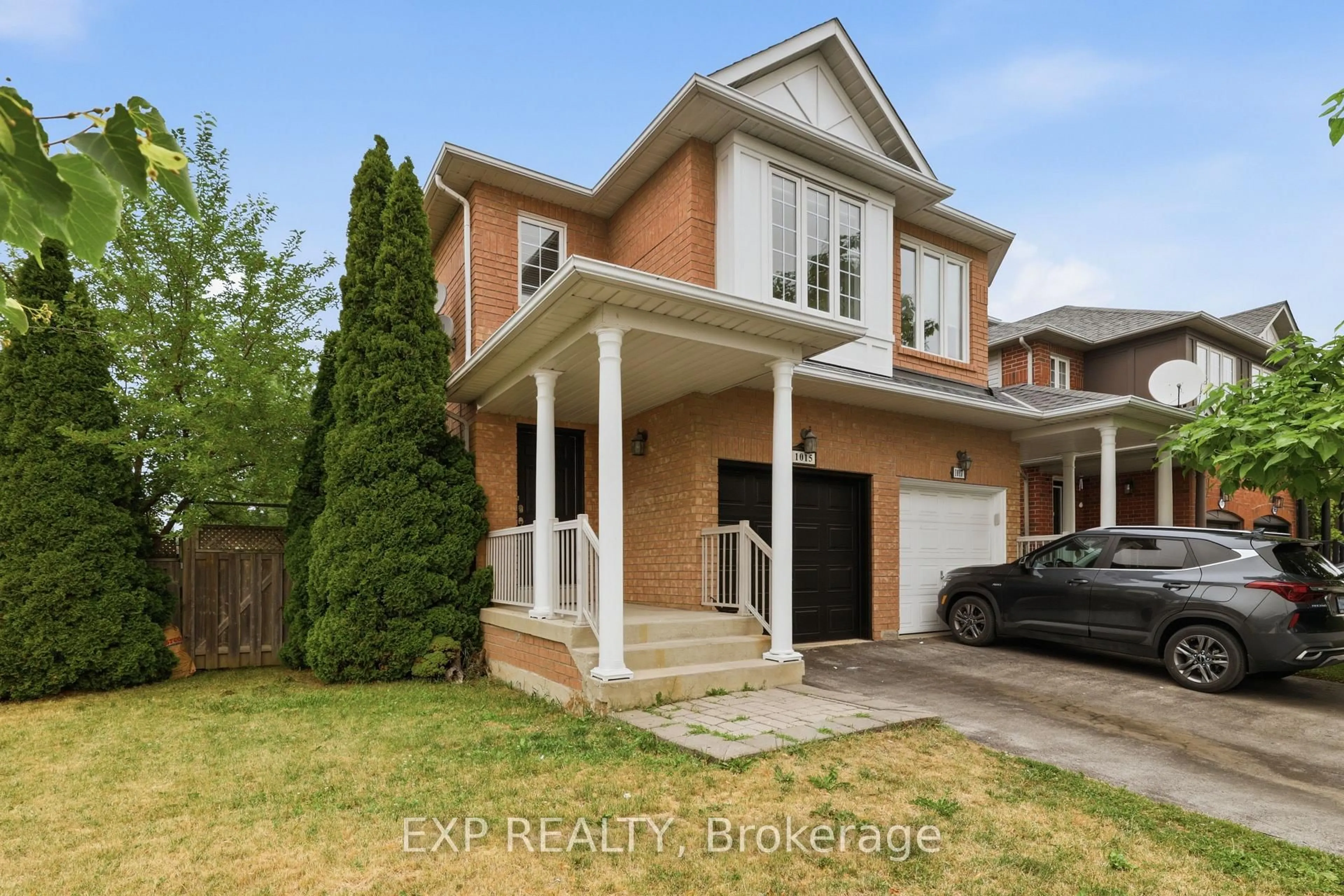 Home with brick exterior material, street for 1015 Borden Lane, Milton Ontario L9T 5N9