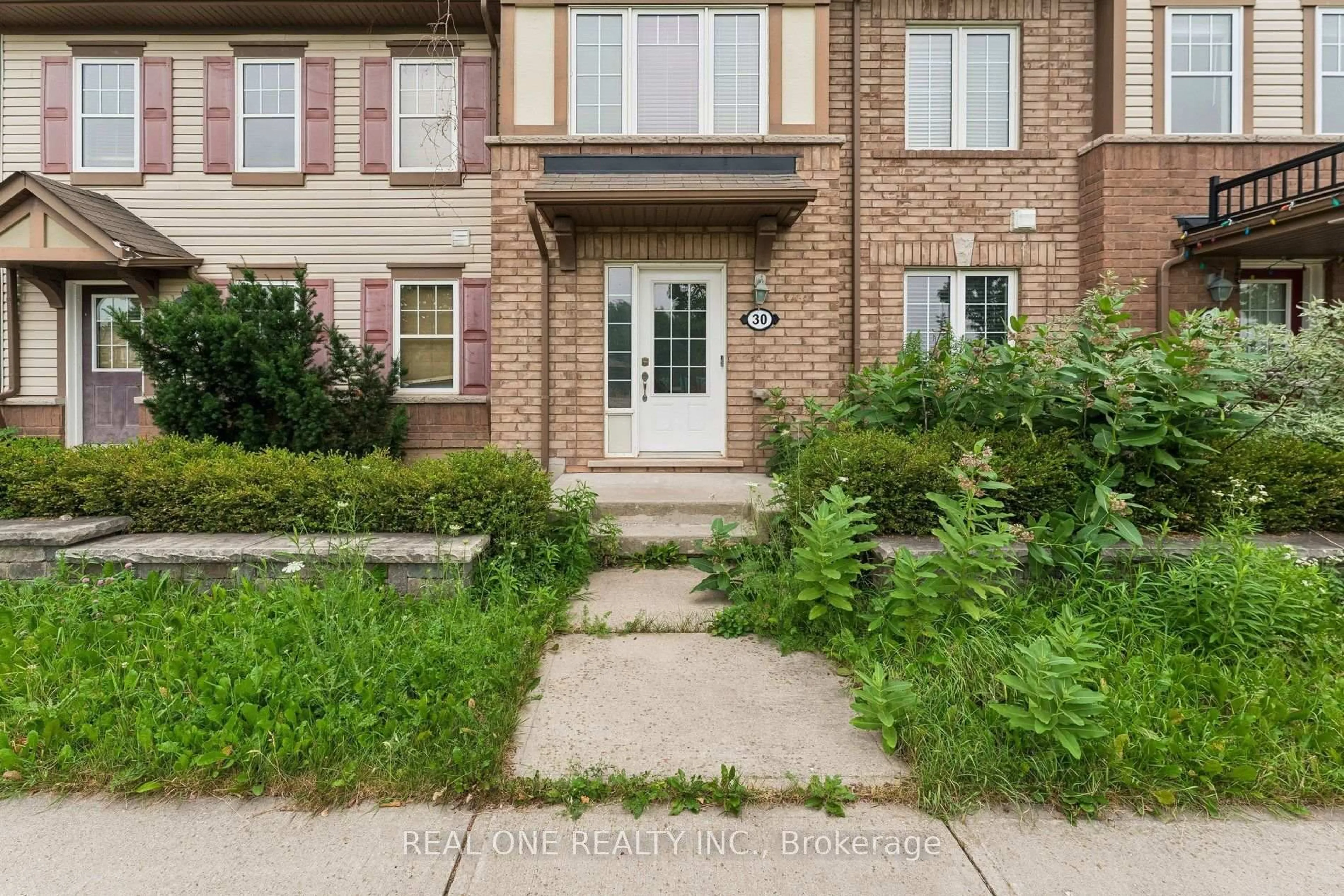 Home with brick exterior material, street for 30 Henneberry Lane, Brampton Ontario L7A 0V8