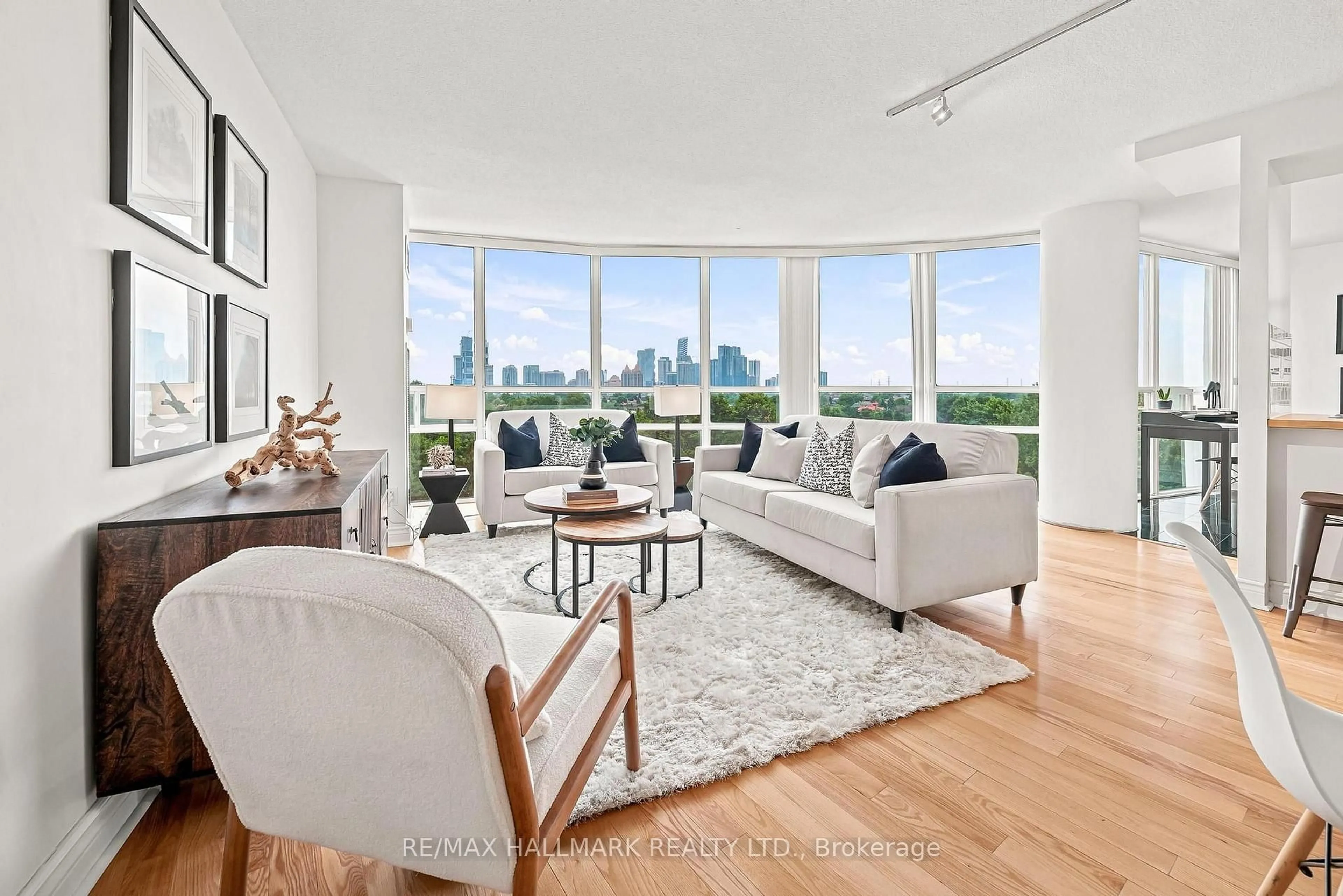 Living room with furniture, unknown for 50 Eglinton Ave #607, Mississauga Ontario L5R 3P5