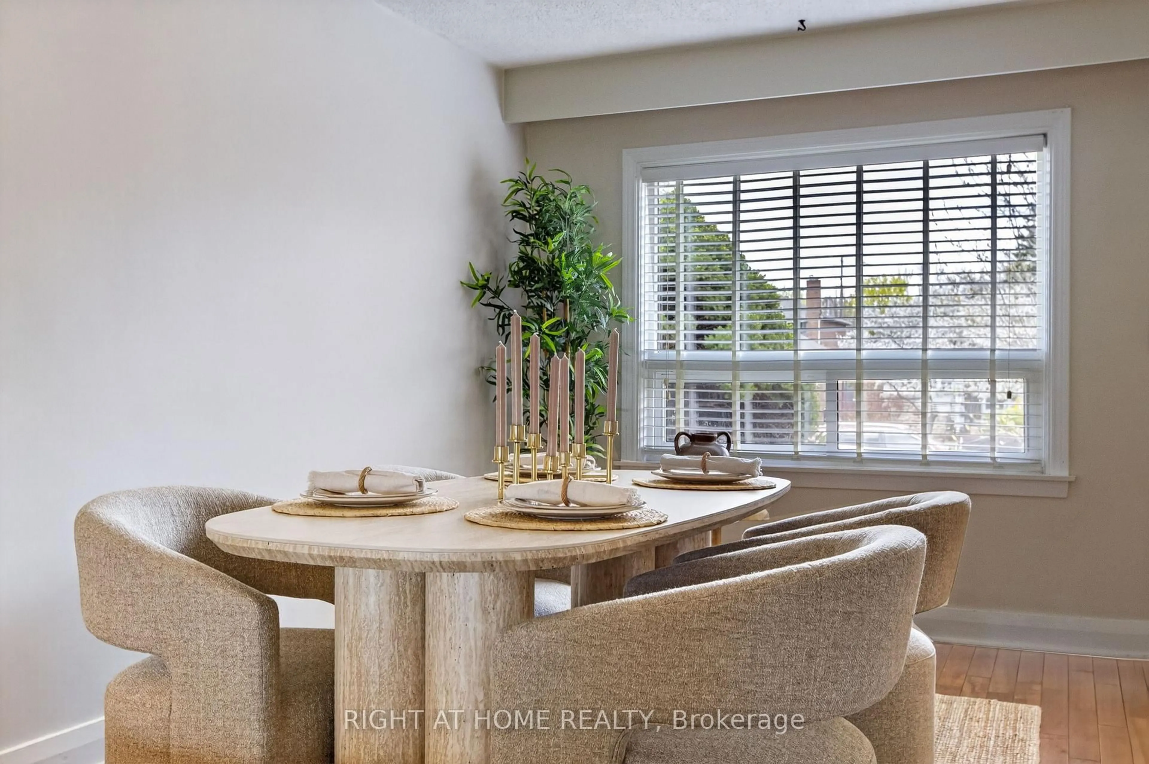 Dining room, wood/laminate floor for 77 Elma St, Toronto Ontario M8V 1X9