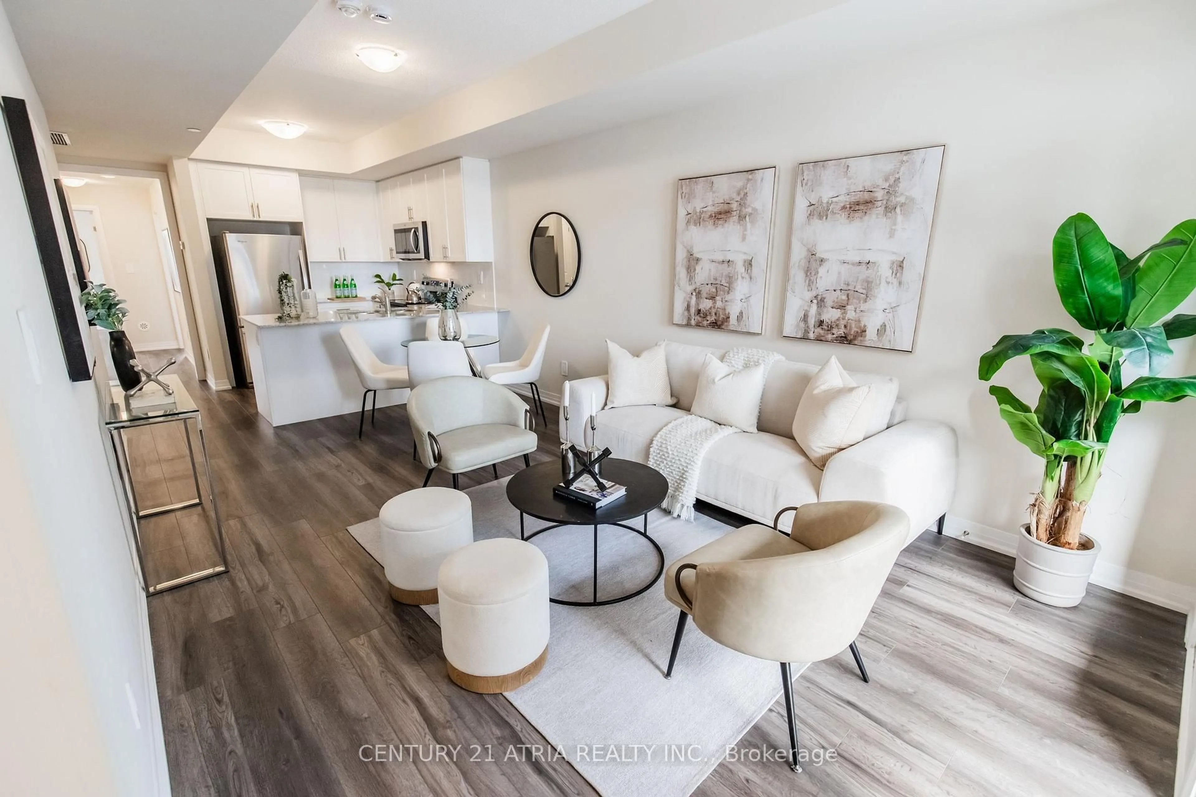 Living room with furniture, unknown for 1597 Rose Way #112, Milton Ontario L9E 1N4