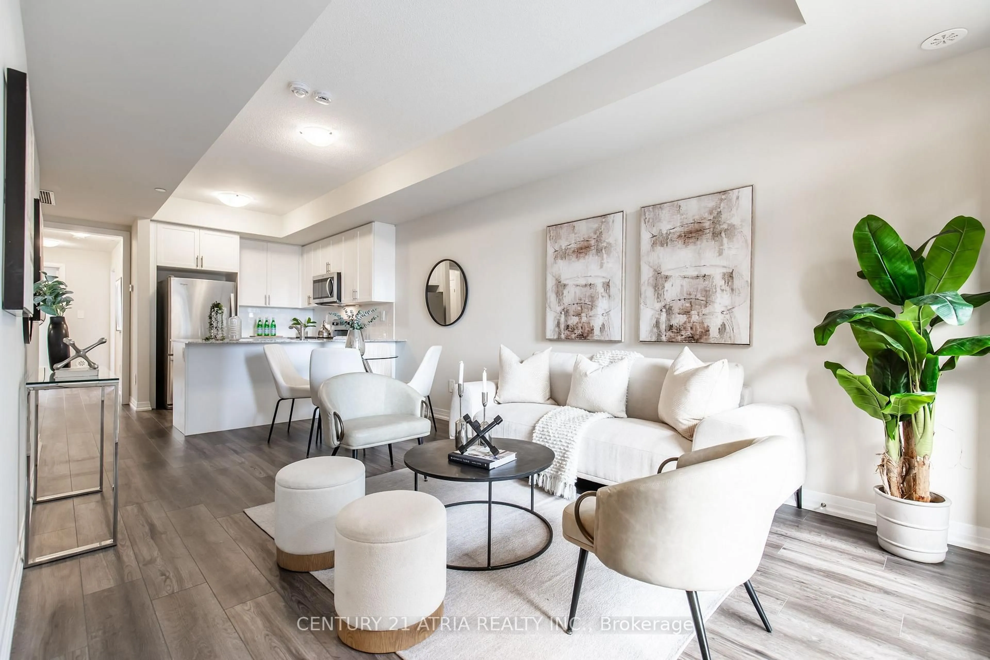 Living room with furniture, unknown for 1597 Rose Way #112, Milton Ontario L9E 1N4