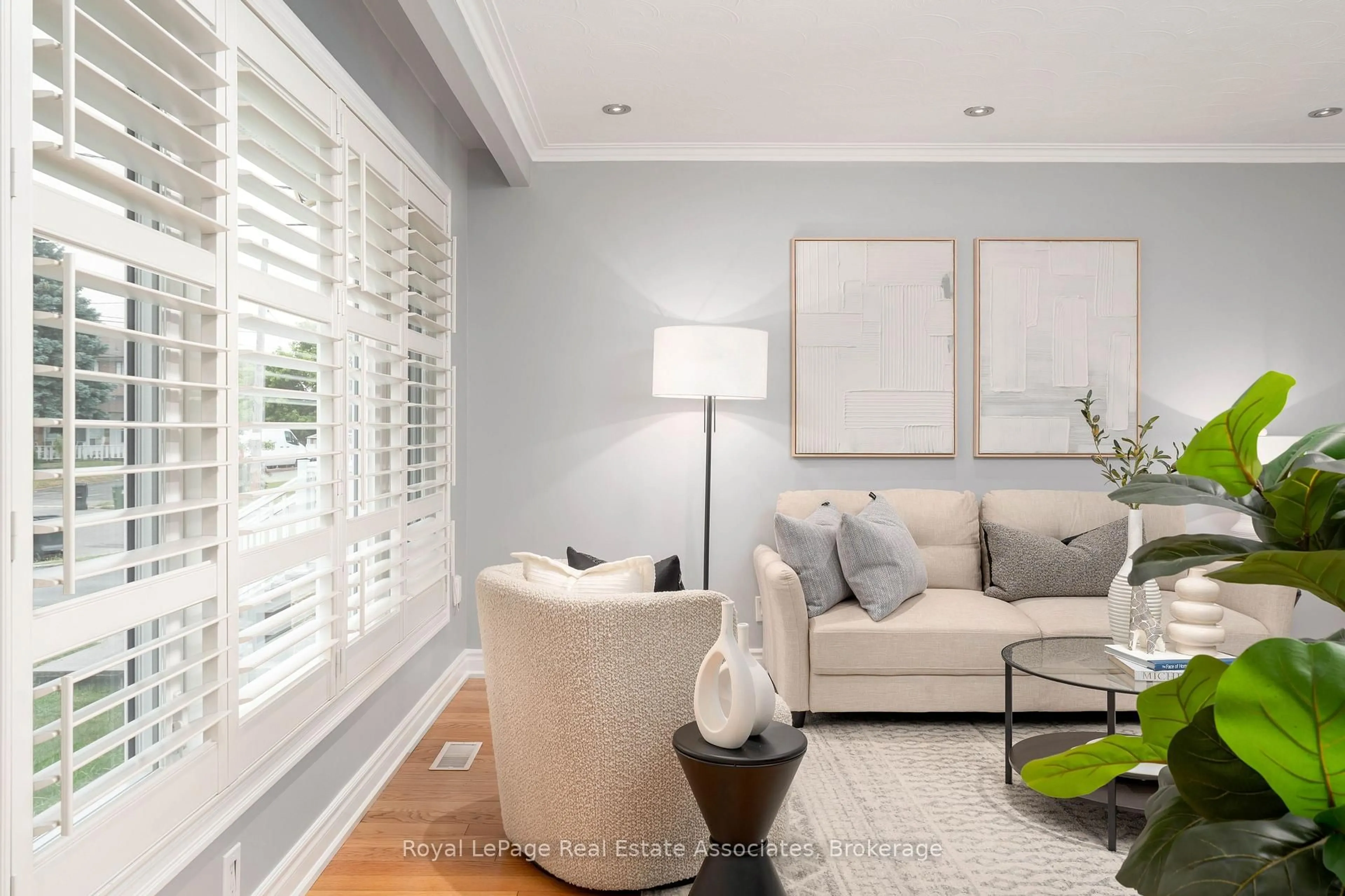 Living room with furniture, wood/laminate floor for 12 Anchor Dr, Toronto Ontario M3L 2A6