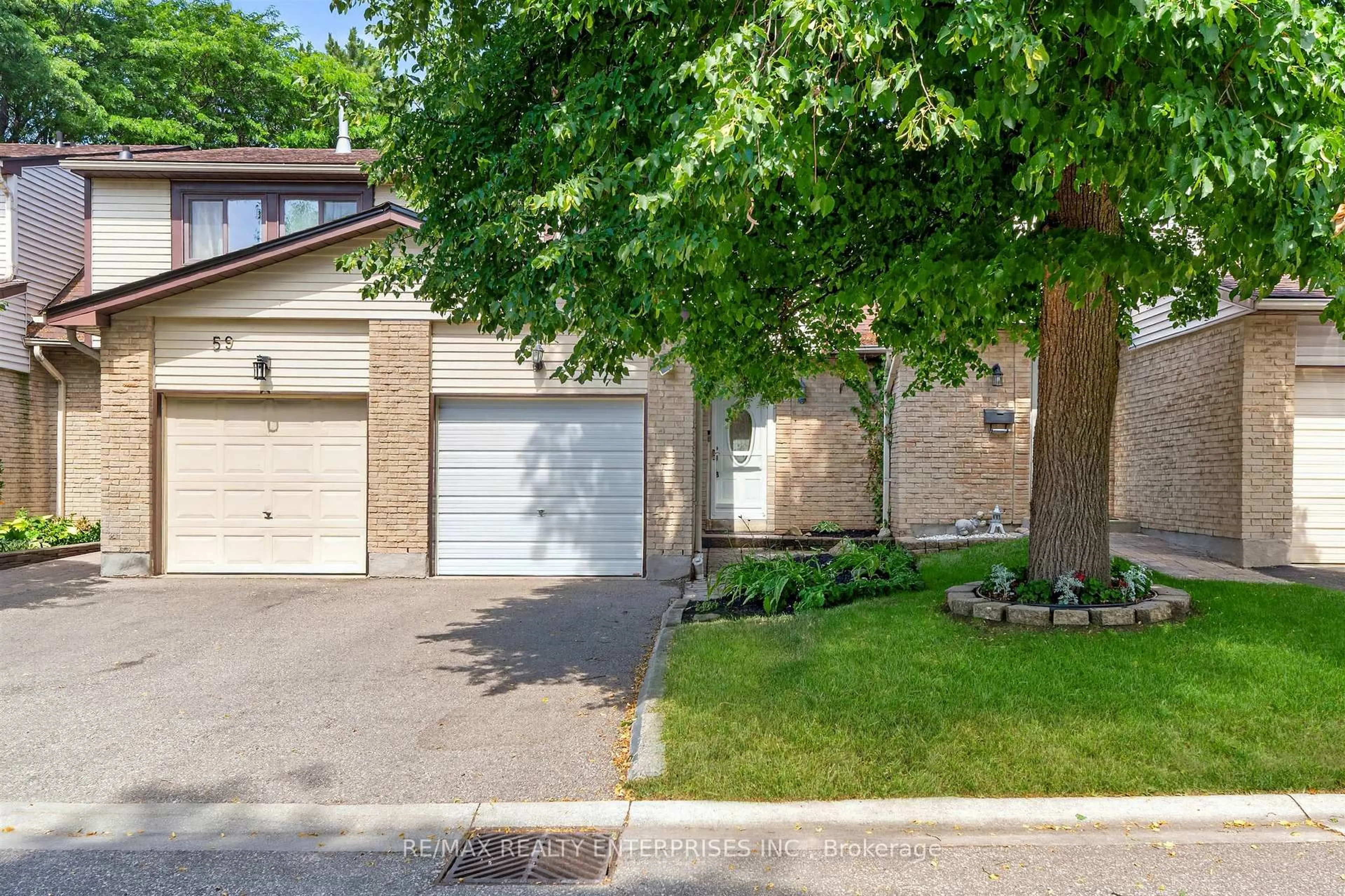 Home with brick exterior material, street for 5610 Montevideo Rd #60, Mississauga Ontario L5N 2N9