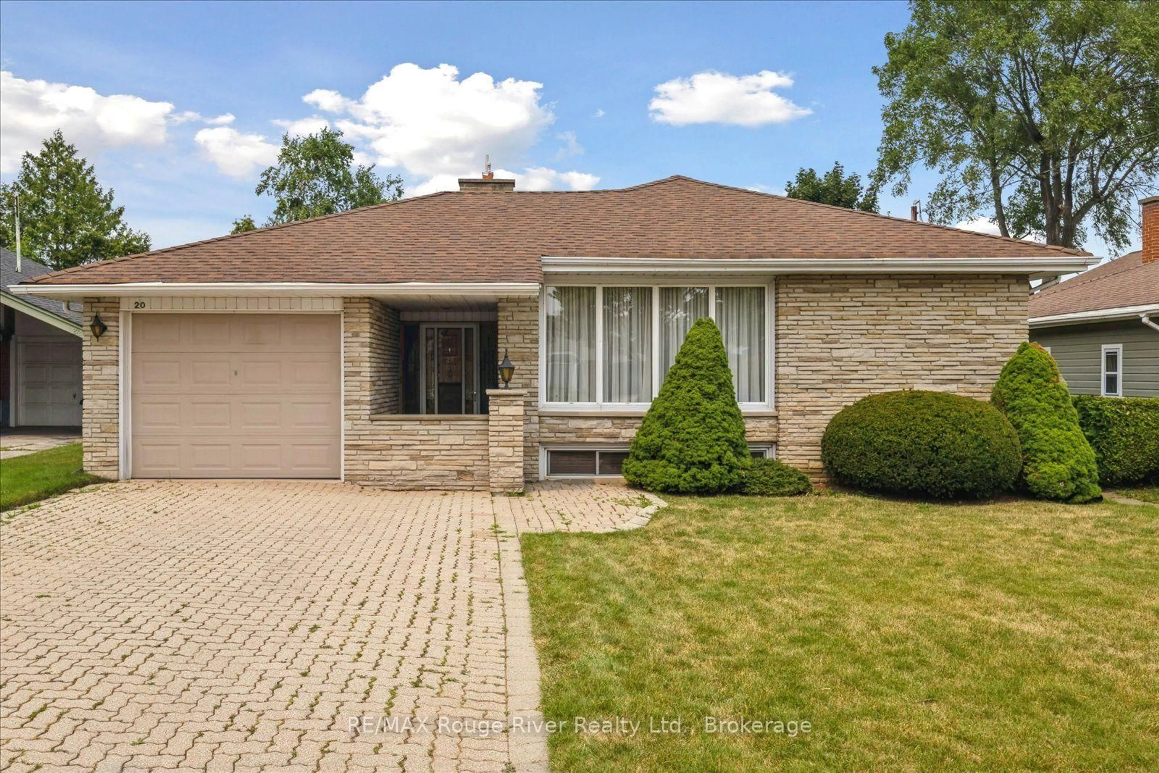 Home with brick exterior material, street for 20 Tayrow Rd, Toronto Ontario M9W 2T9