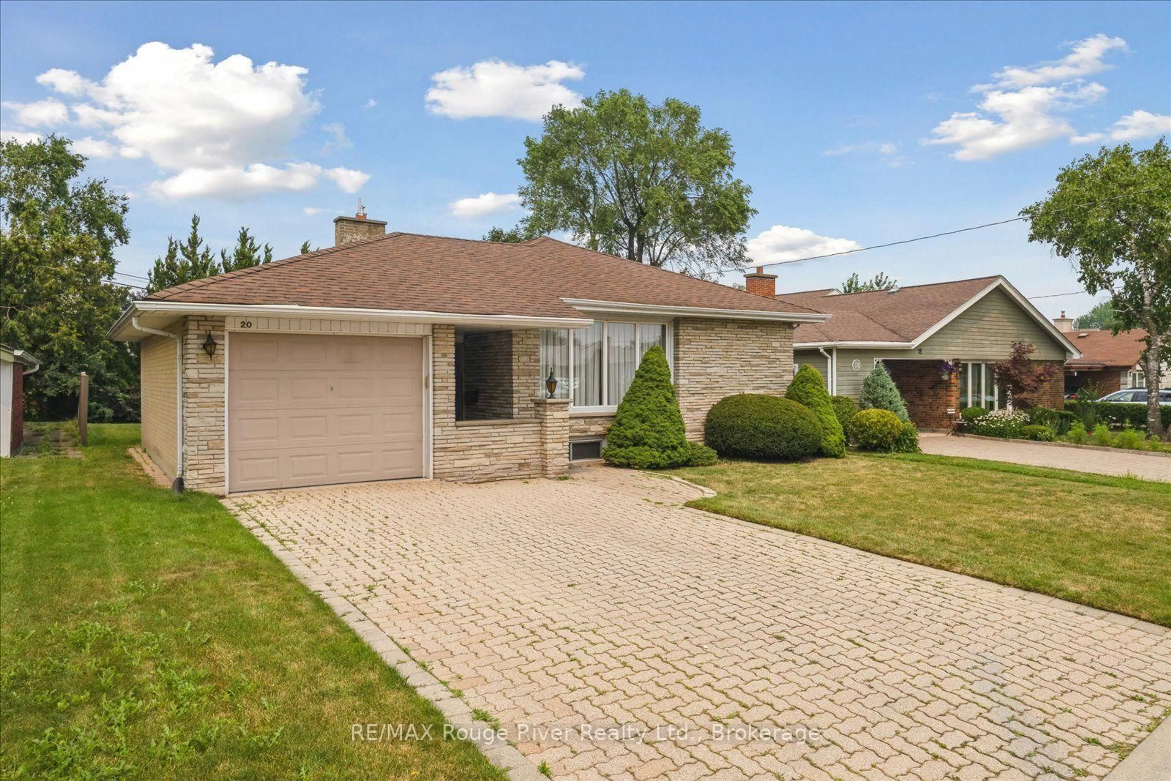 Home with brick exterior material, street for 20 Tayrow Rd, Toronto Ontario M9W 2T9