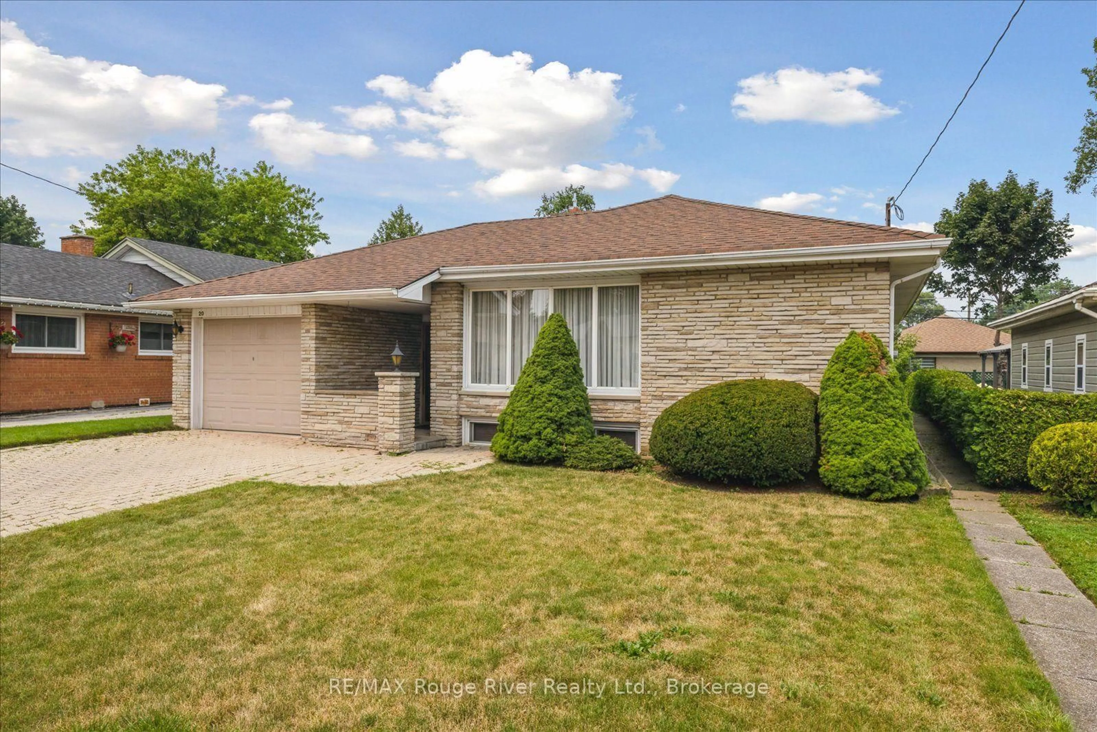 Home with brick exterior material, street for 20 Tayrow Rd, Toronto Ontario M9W 2T9