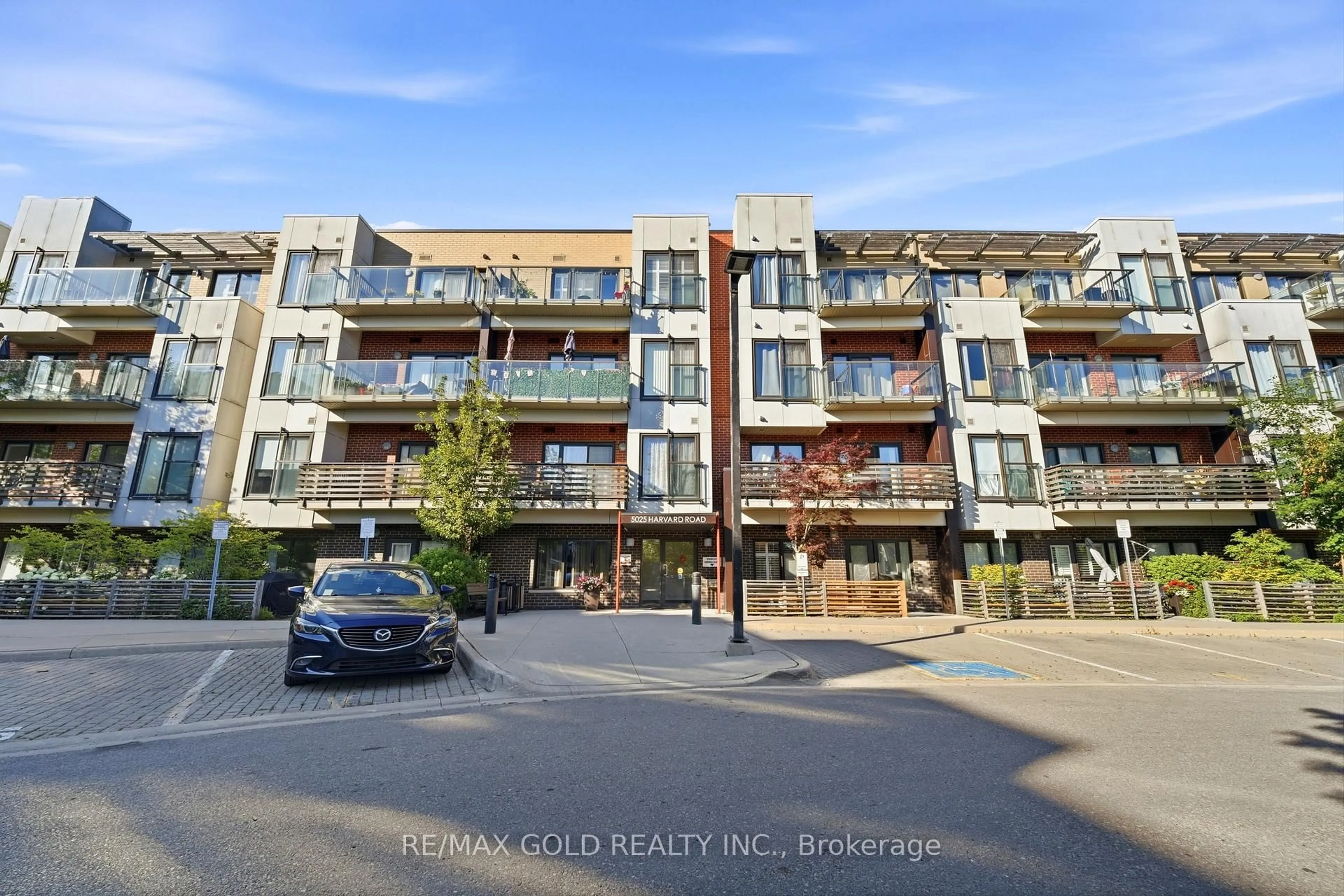 A pic from outside/outdoor area/front of a property/back of a property/a pic from drone, street for 5025 Harvard Rd #211, Mississauga Ontario L5M 0W6