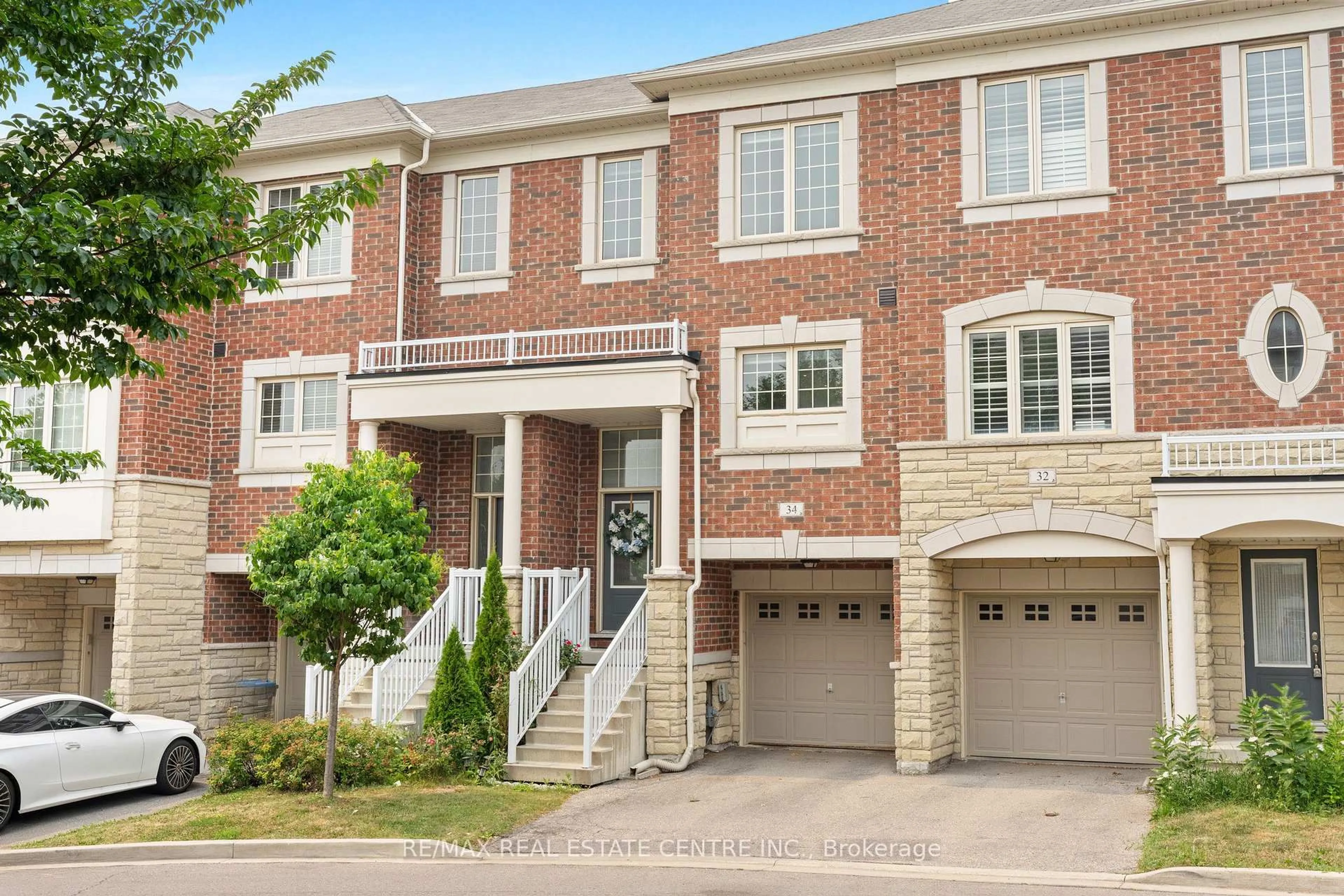 Home with brick exterior material, street for 34 Aspen Hills Rd, Brampton Ontario L6Y 0H7