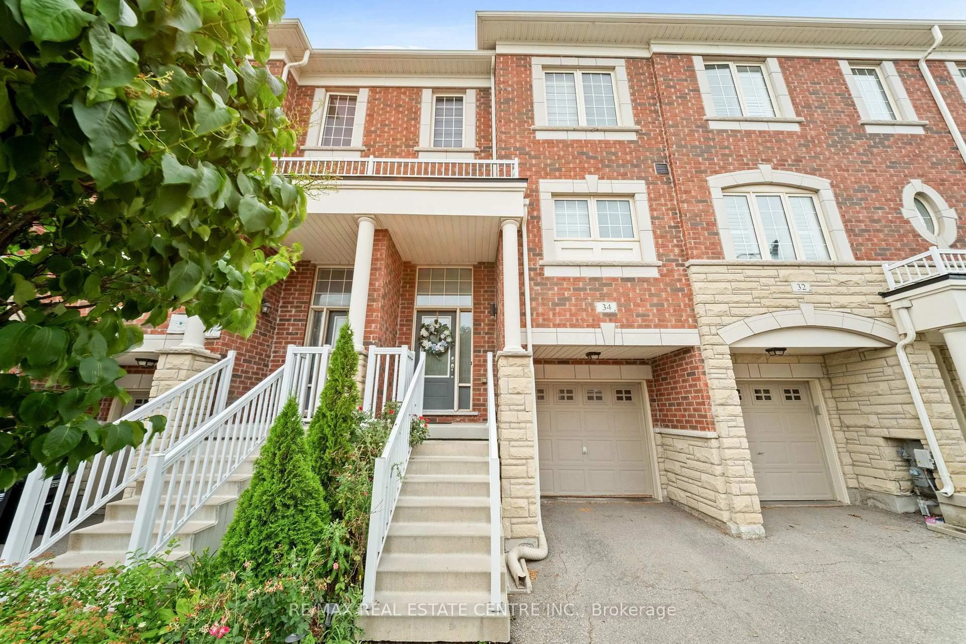 Home with brick exterior material, street for 34 Aspen Hills Rd, Brampton Ontario L6Y 0H7