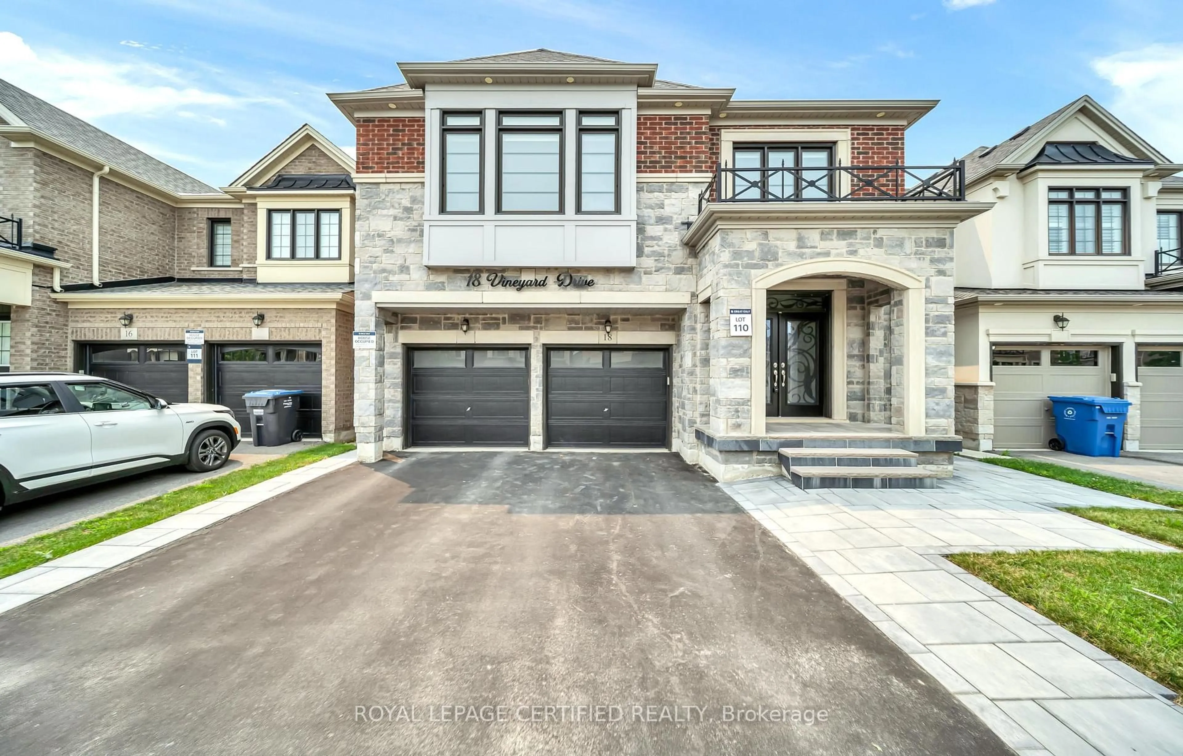 Home with brick exterior material, street for 18 Vineyard Dr, Brampton Ontario L6Y 2A5