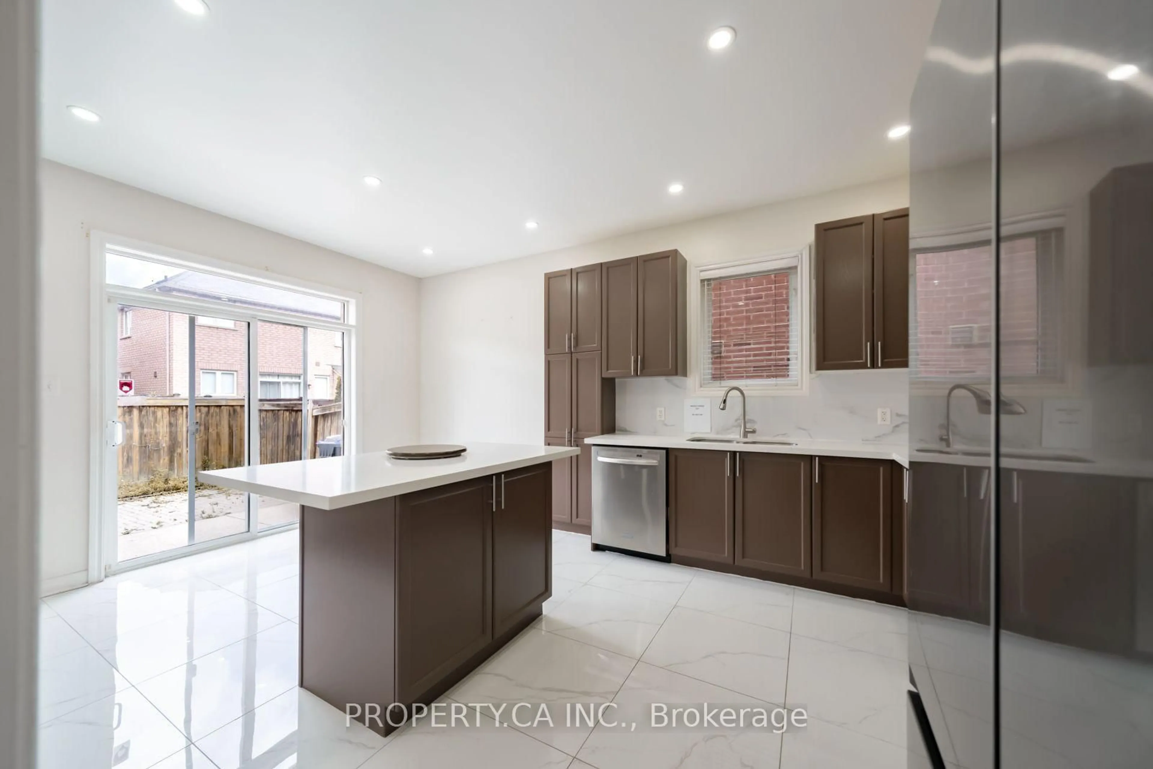 Open concept kitchen, ceramic/tile floor for 75 Iron Block Dr, Brampton Ontario L7A 0K2
