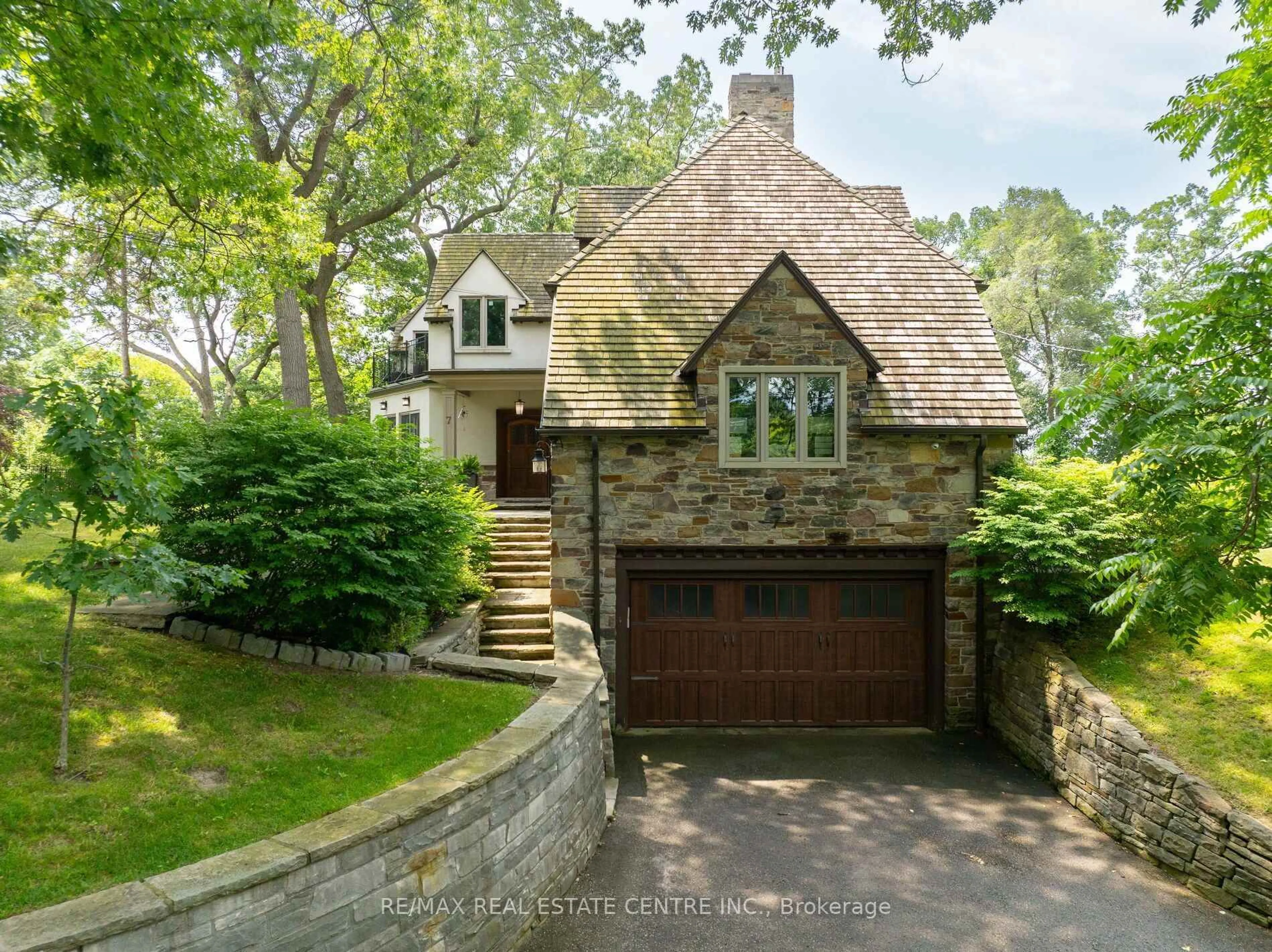 Home with brick exterior material, street for 7 Riverside Tr, Toronto Ontario M6S 1G6