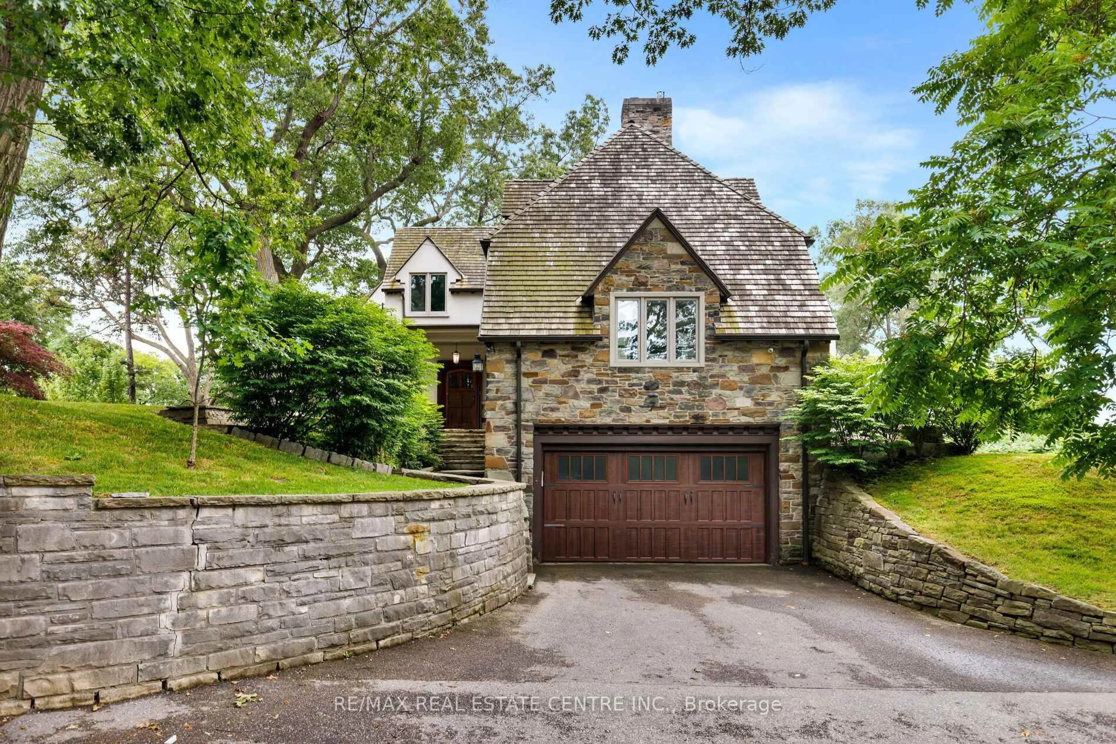 Home with brick exterior material, street for 7 Riverside Tr, Toronto Ontario M6S 1G6