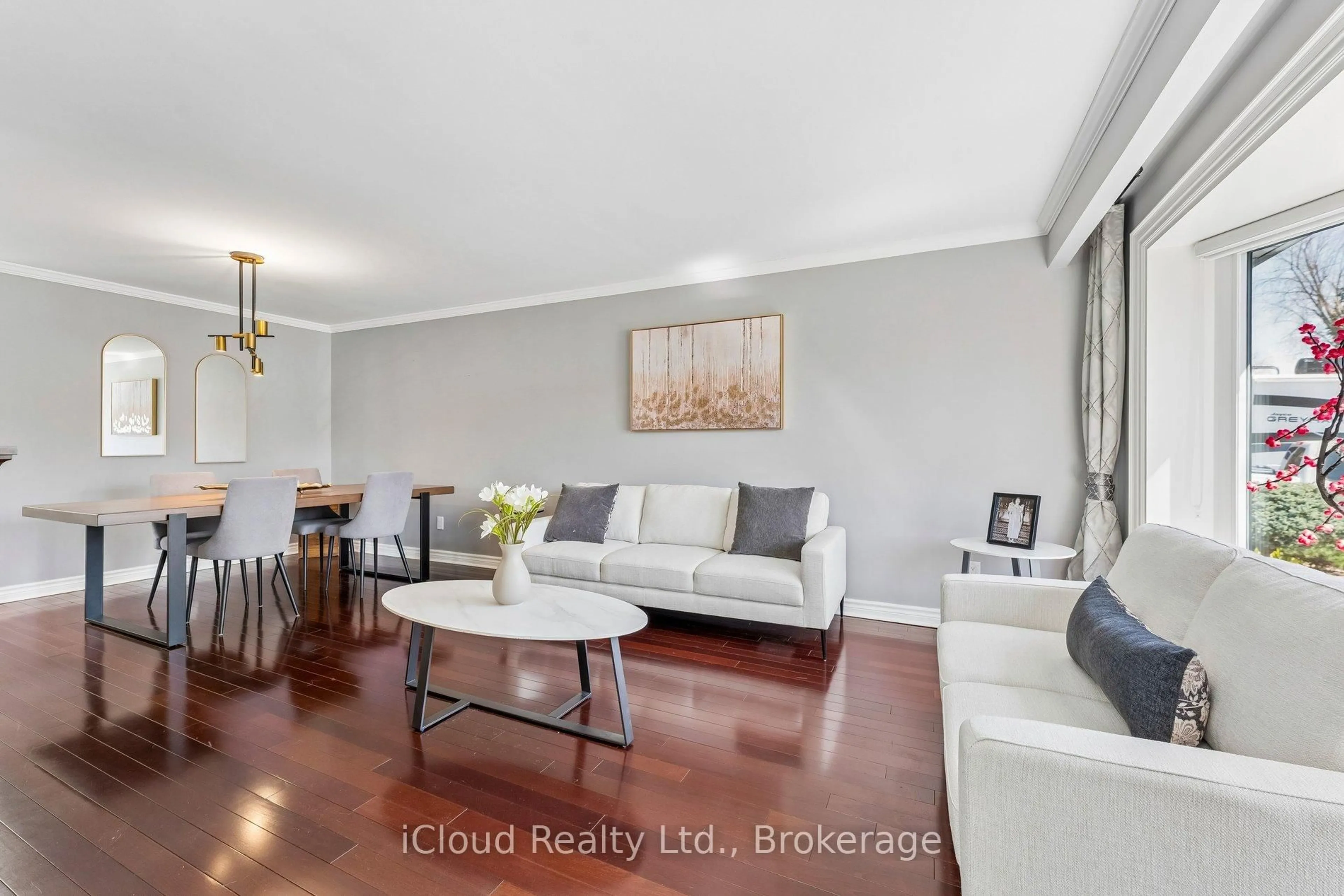 Living room with furniture, wood/laminate floor for 43 Ferndale Cres, Brampton Ontario L6W 1G1