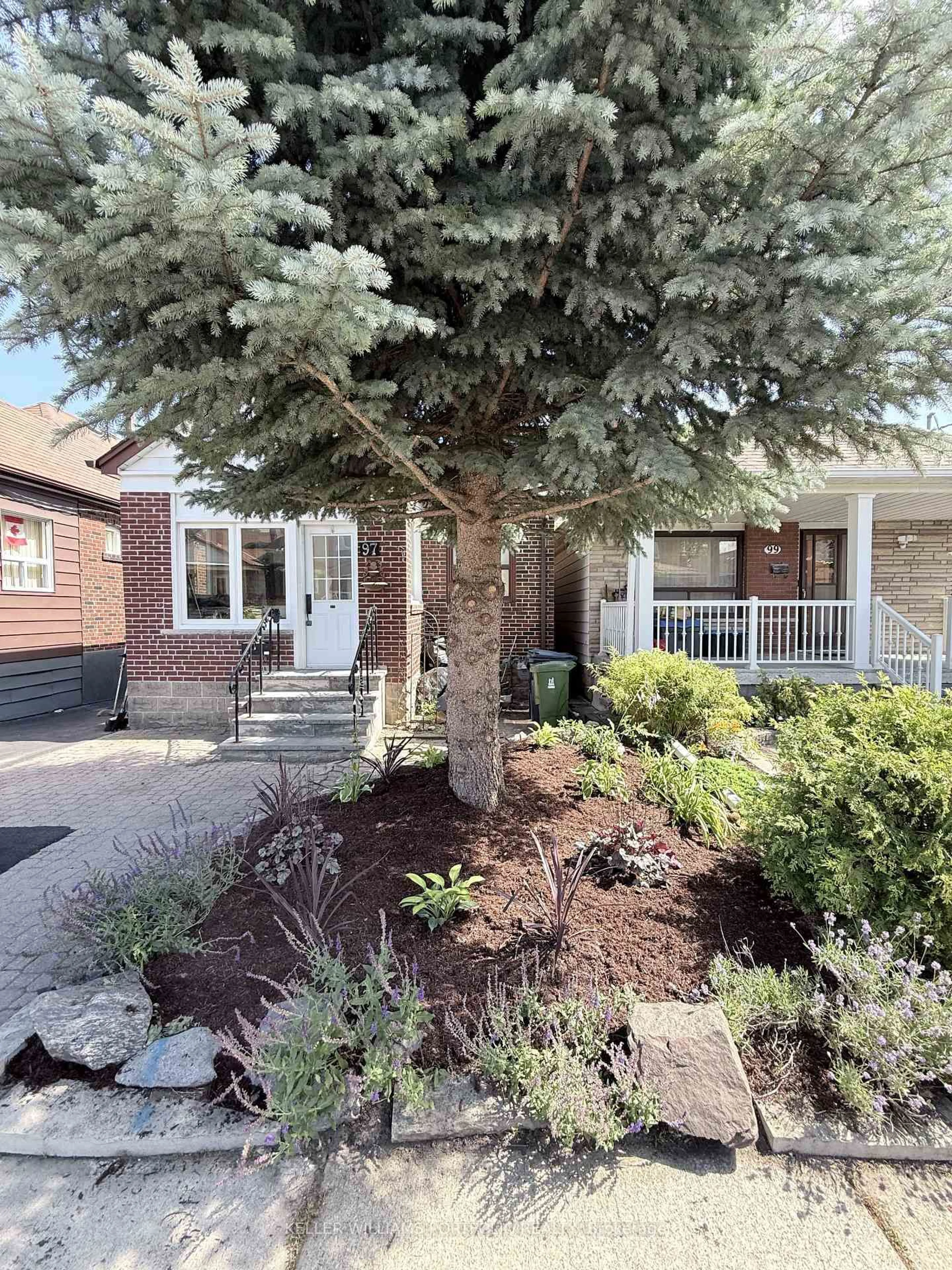 Home with brick exterior material, street for 97 Livingstone Ave, Toronto Ontario M6E 2L7