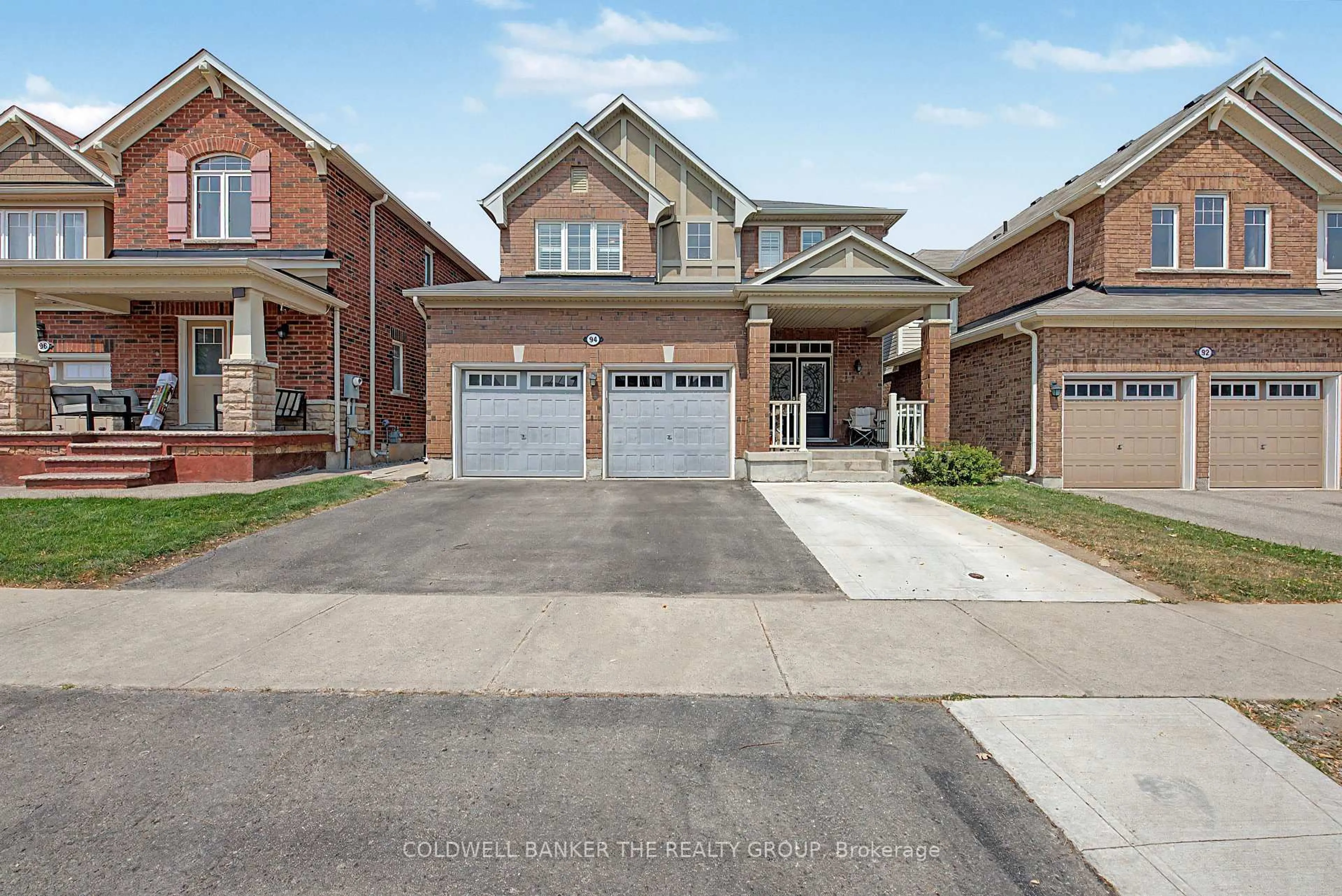 Home with brick exterior material, street for 94 Enford Cres, Brampton Ontario L7A 4C8