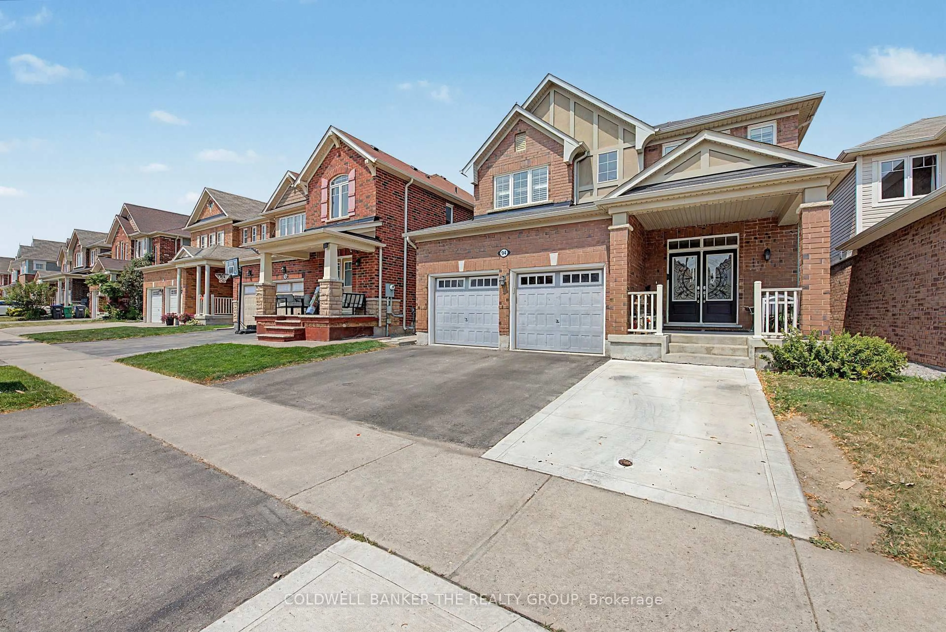 Home with brick exterior material, street for 94 Enford Cres, Brampton Ontario L7A 4C8