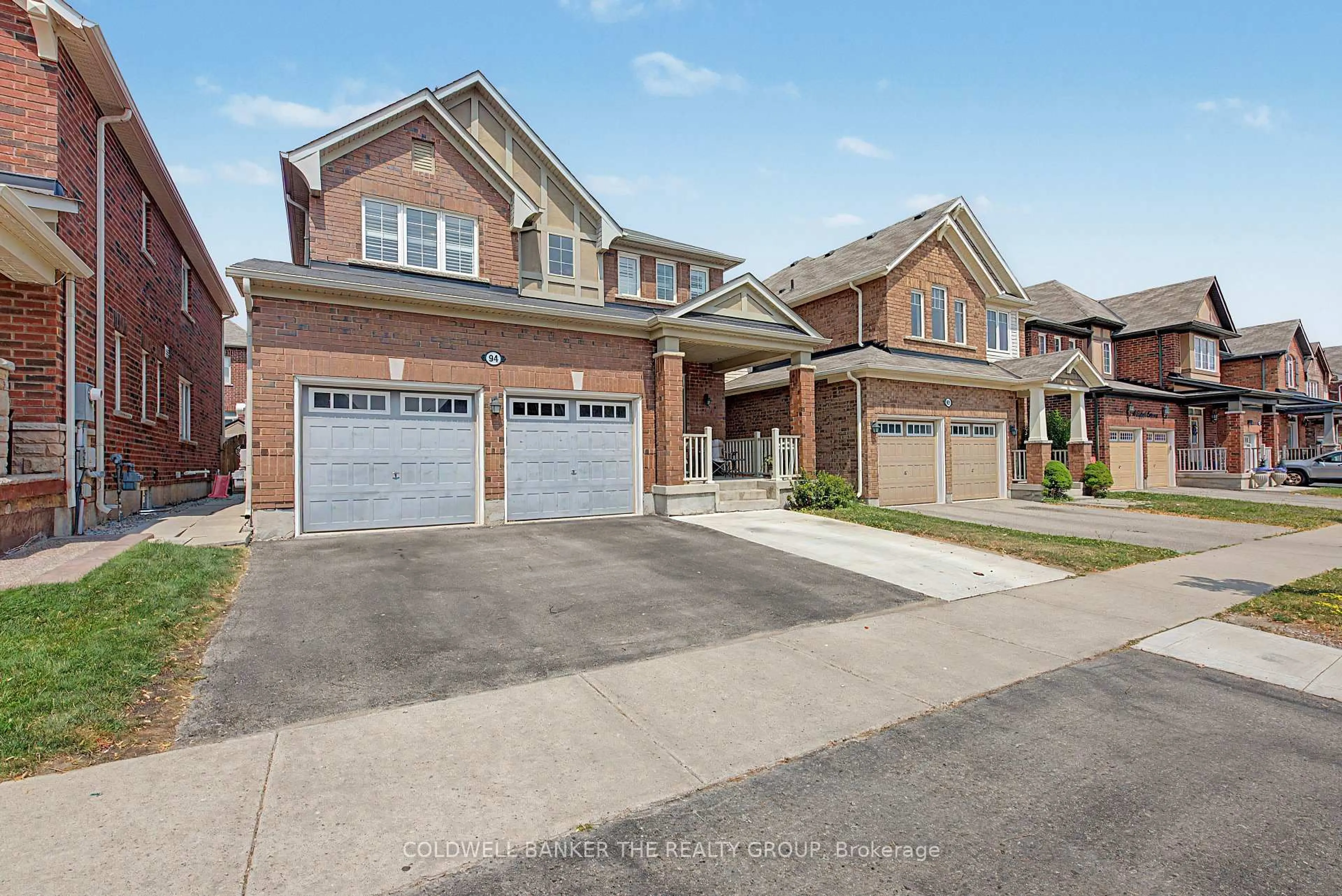 Home with brick exterior material, street for 94 Enford Cres, Brampton Ontario L7A 4C8