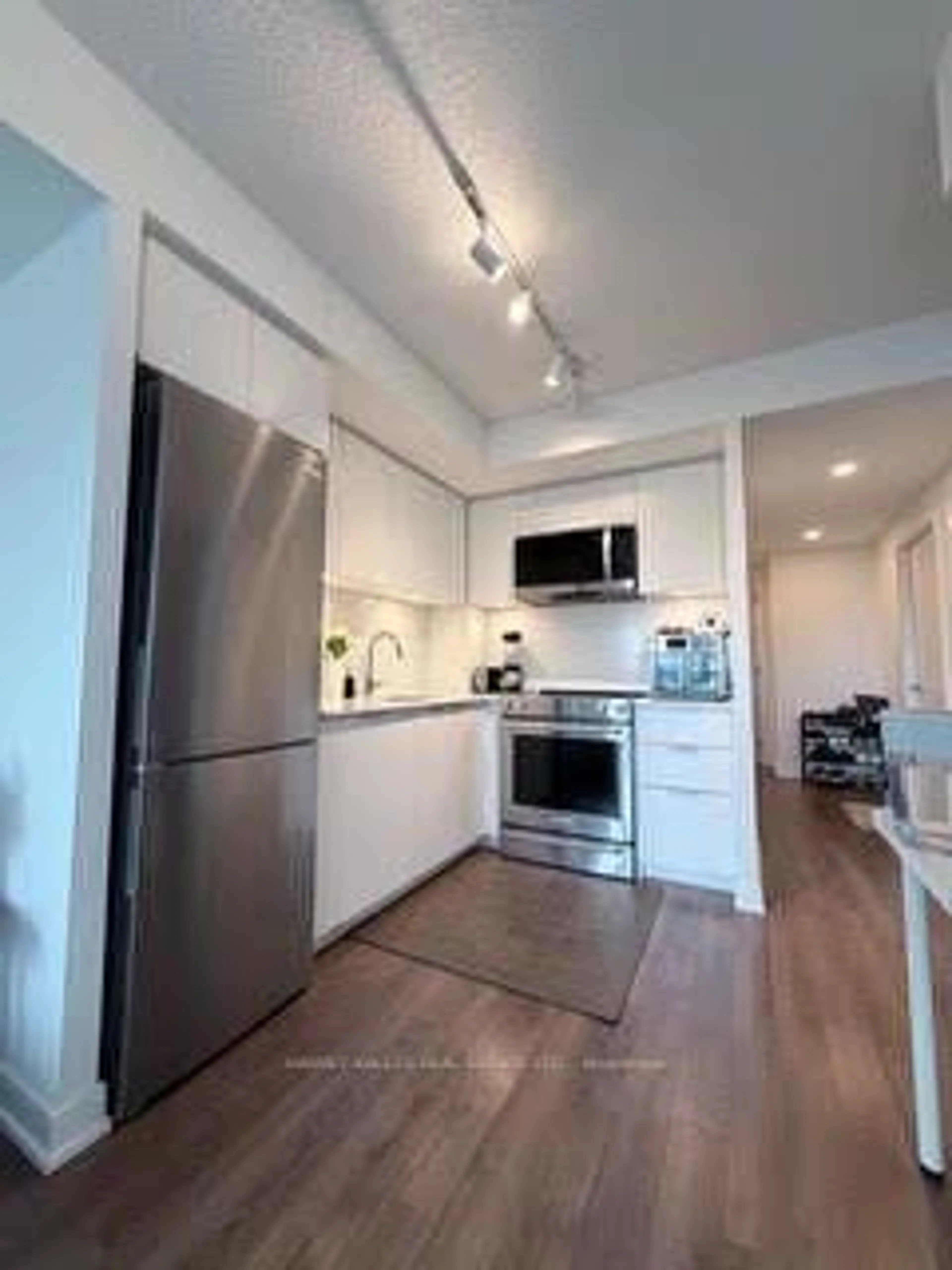 Open concept kitchen, unknown for 30 Samuel Wood Way #901, Toronto Ontario M9B 6K4