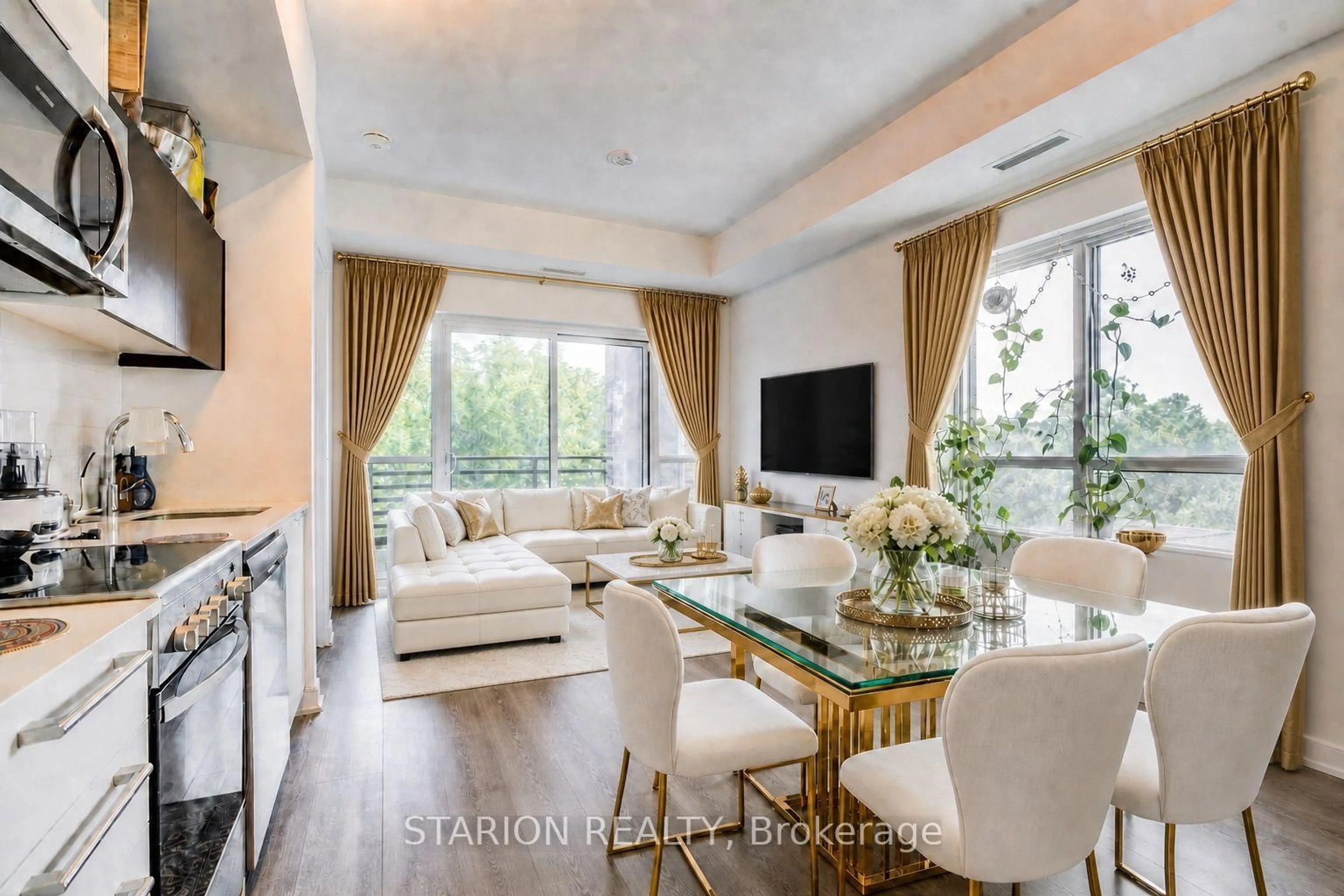 Living room with furniture, unknown for 25 Neighbourhood Lane #513, Toronto Ontario M8Y 0C4