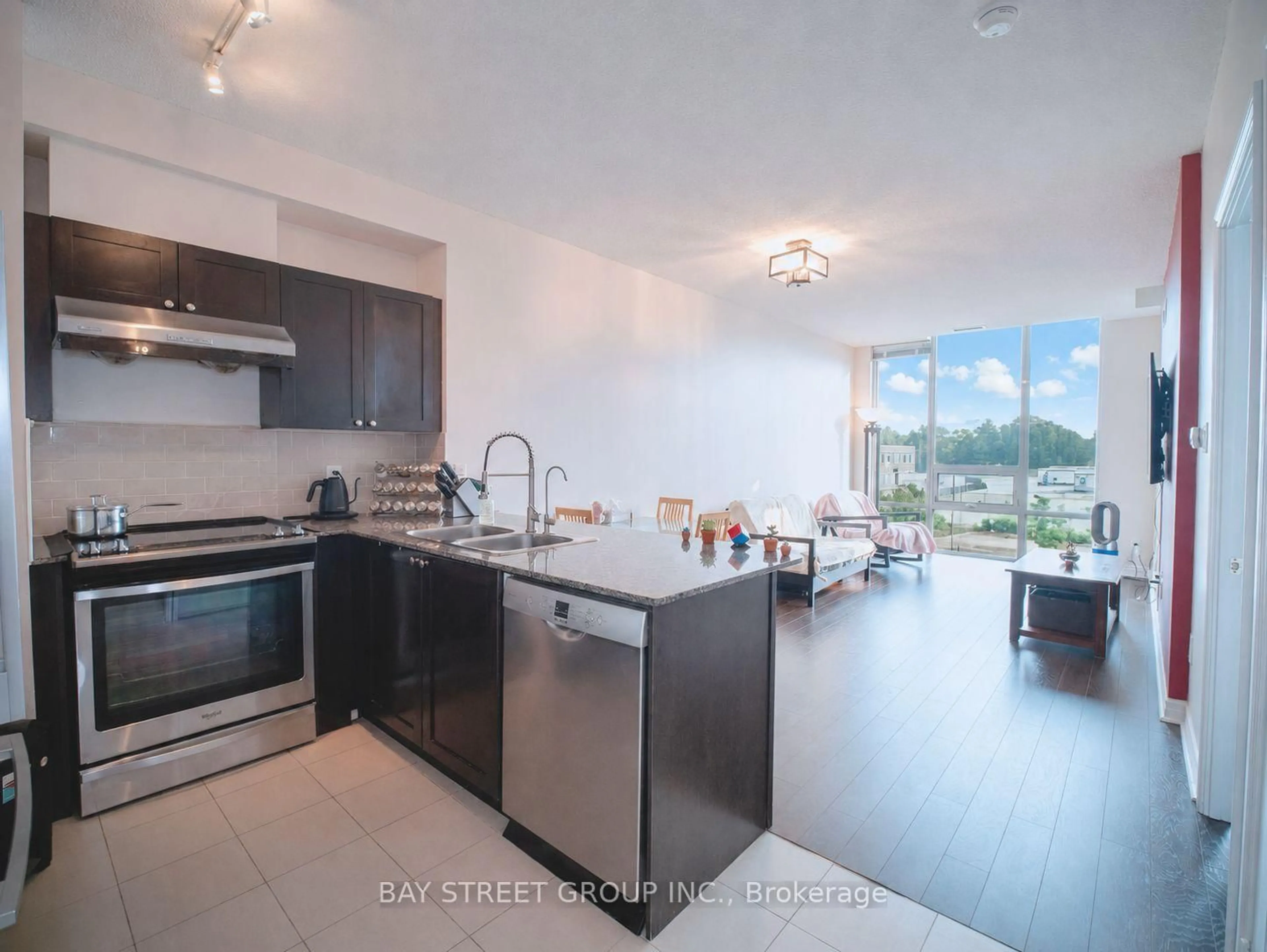 Open concept kitchen, ceramic/tile floor for 3525 Kariya Dr #307, Mississauga Ontario L5B 0C2