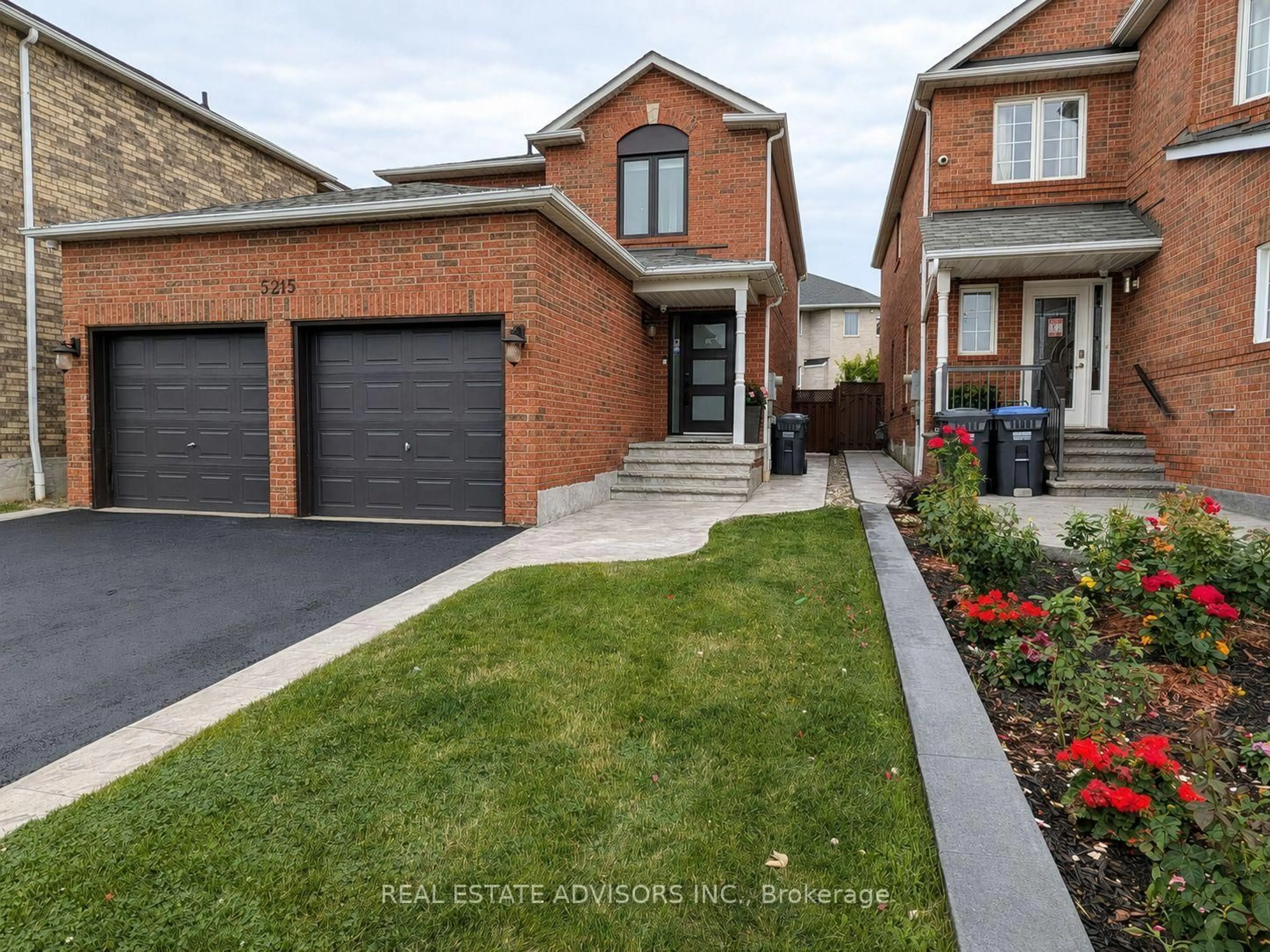 Home with brick exterior material, street for 5215 Marblewood Dr, Mississauga Ontario L5V 2P1