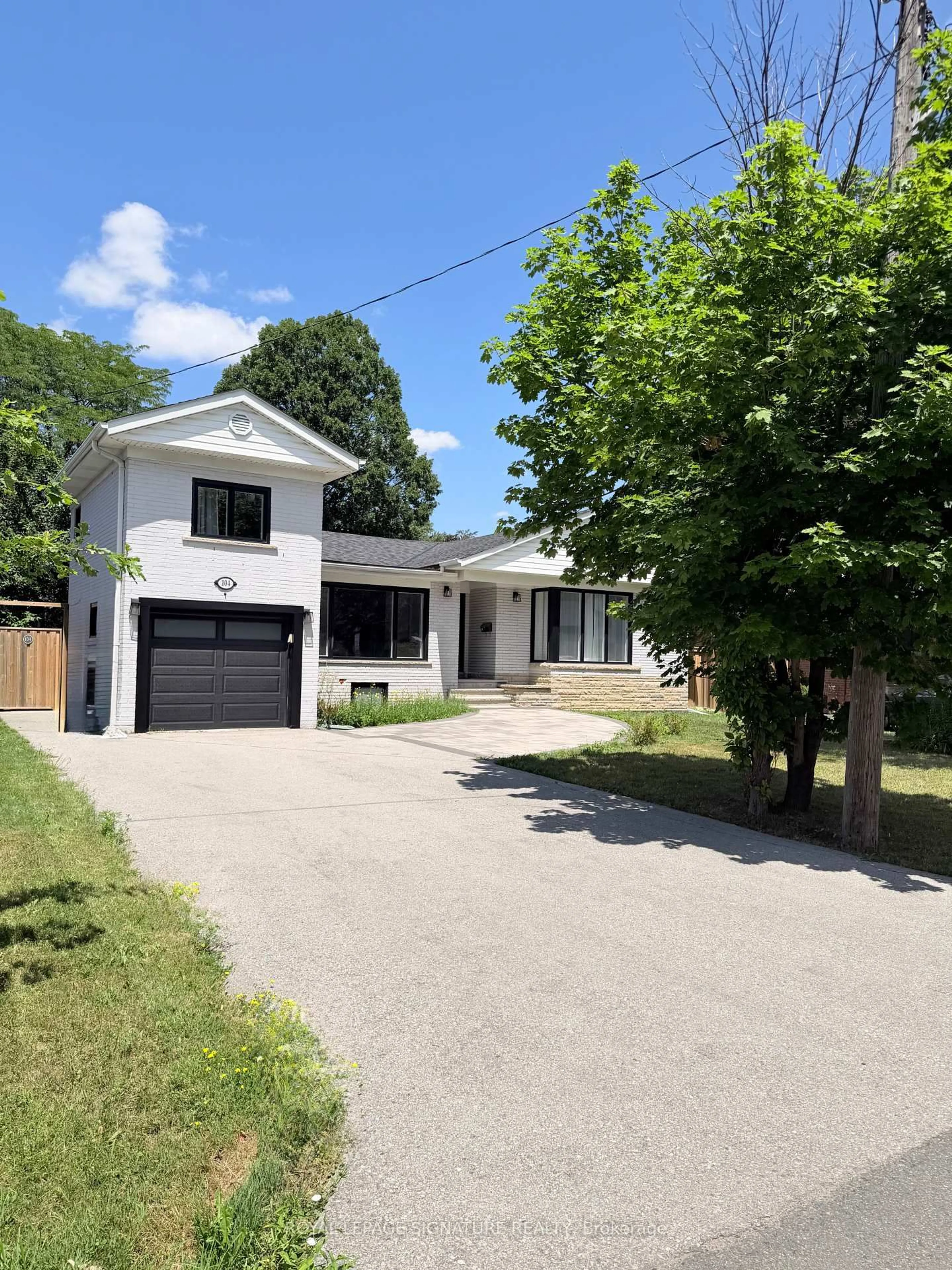 Home with vinyl exterior material, street for 104 Great Oak Dr, Toronto Ontario M9A 1N5