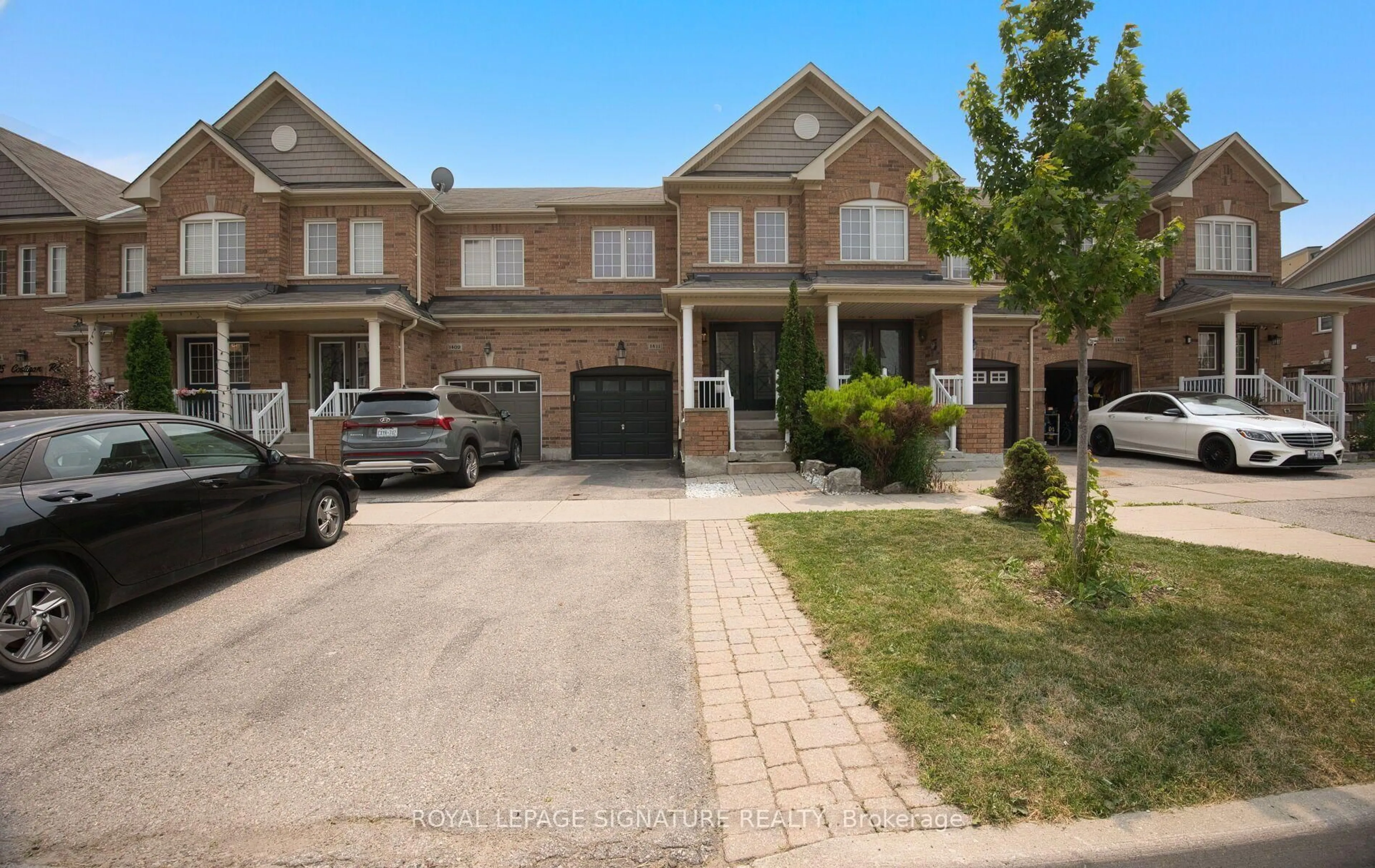 Home with brick exterior material, street for 1411 Costigan Rd, Milton Ontario L9T 0Y7