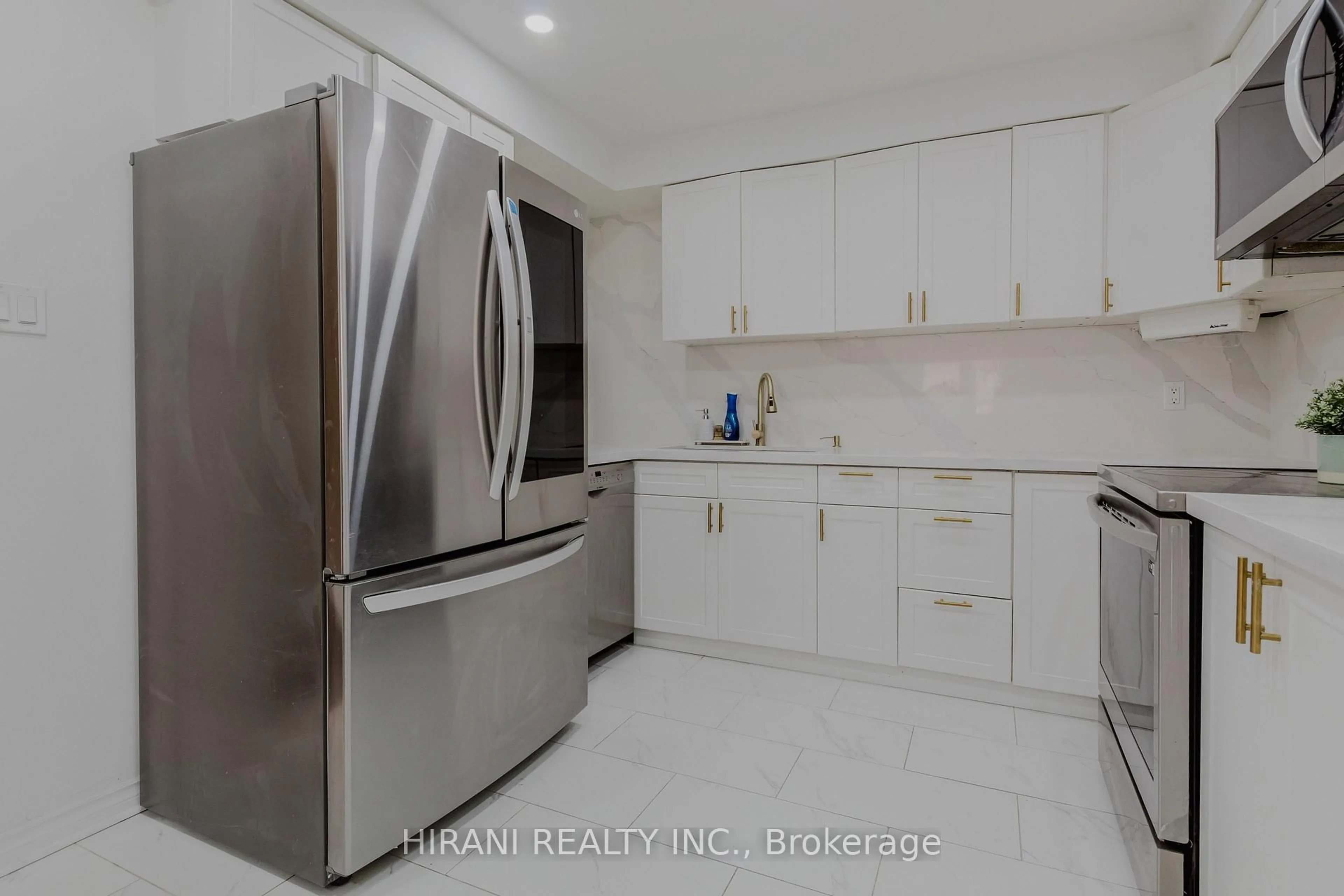 Kitchen with laundary machines, unknown for 75 Royal Salisbury Way, Brampton Ontario L6V 3J3