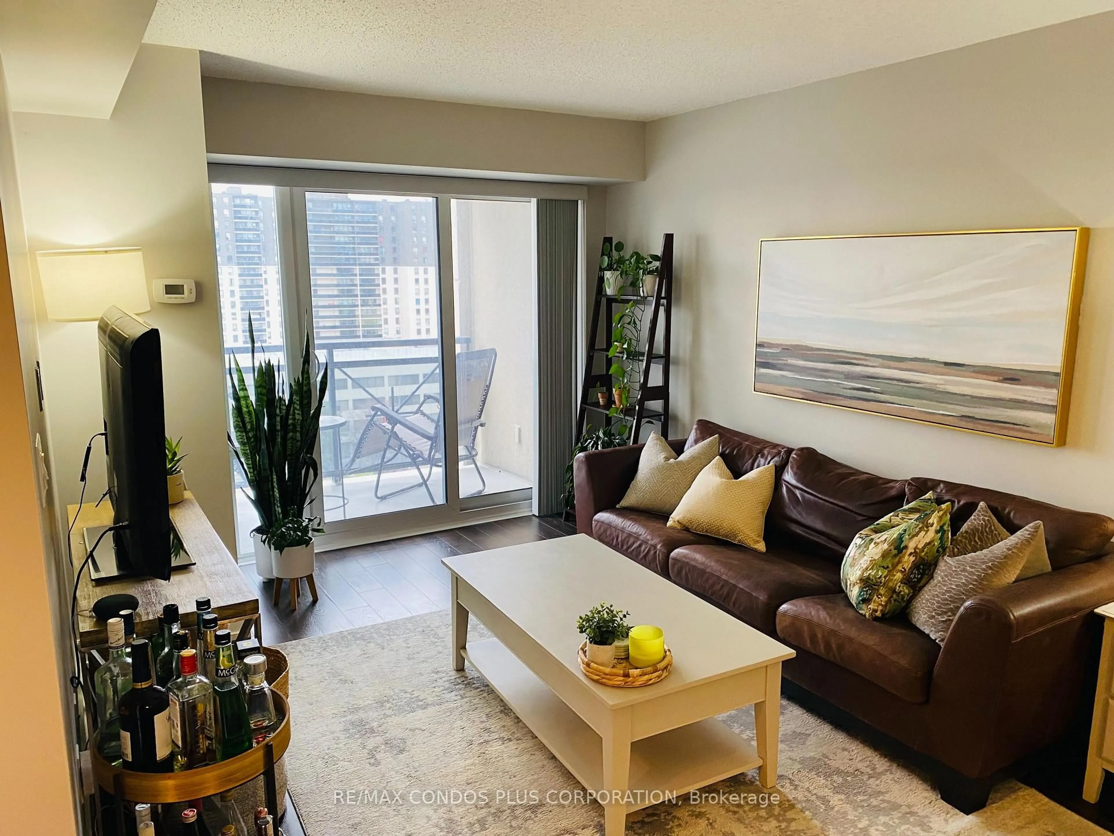 Living room with furniture, unknown for 2 Eva Rd #927, Toronto Ontario M9C 2A8