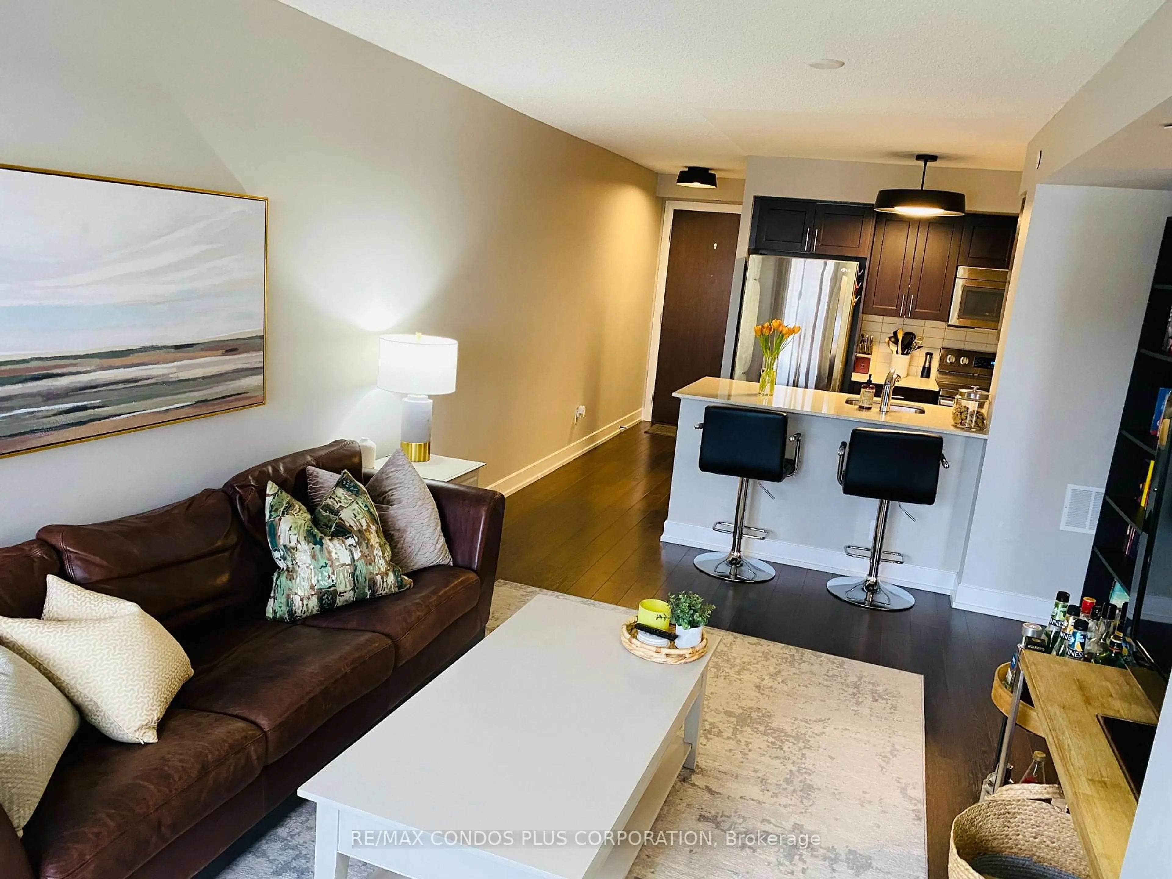 Living room with furniture, unknown for 2 Eva Rd #927, Toronto Ontario M9C 2A8