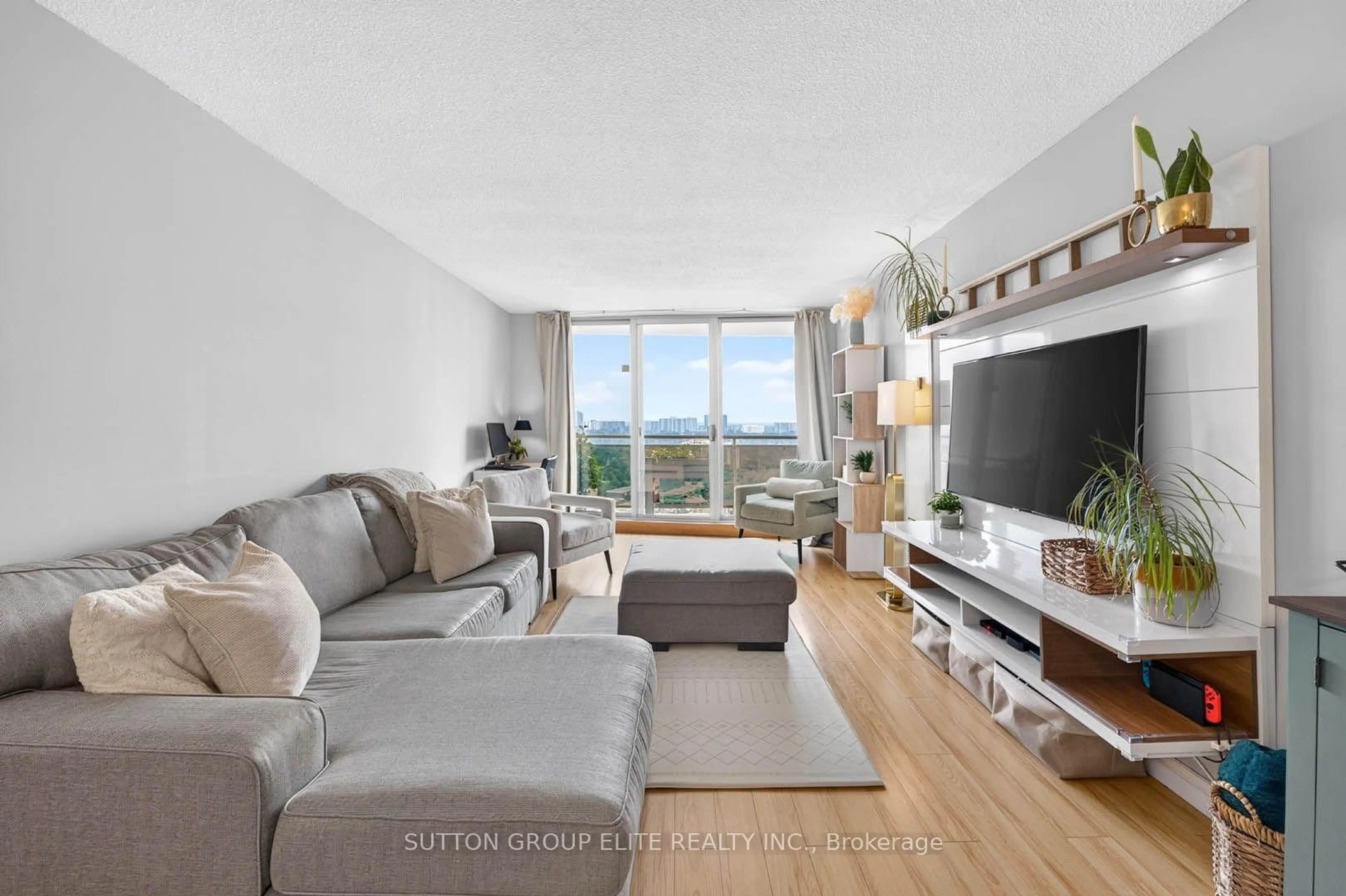 Living room with furniture, unknown for 820 Burnhamthorpe Rd #2010, Toronto Ontario M9C 4W2
