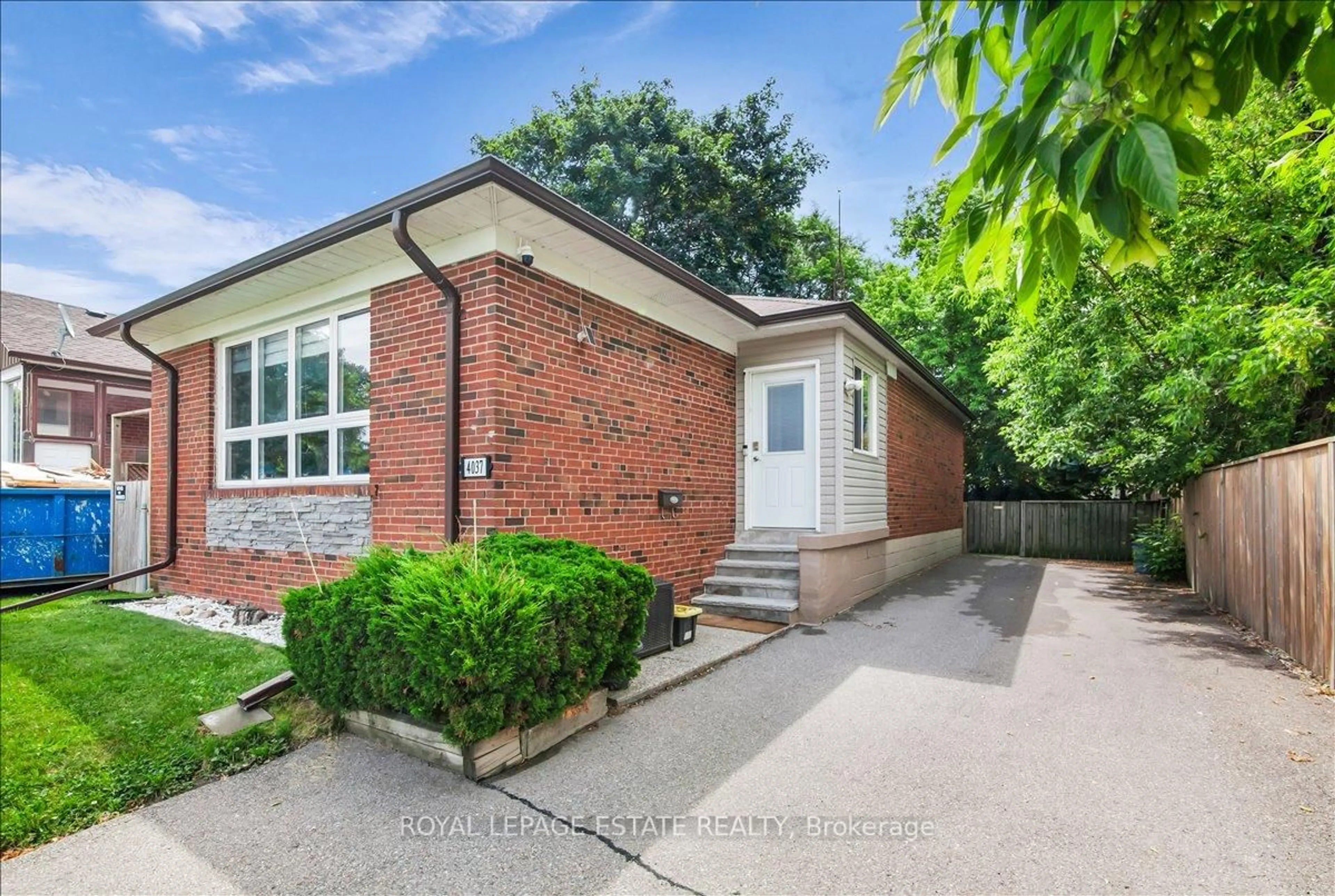 Home with brick exterior material, street for 4037 Bloor St, Toronto Ontario M9B 1M4