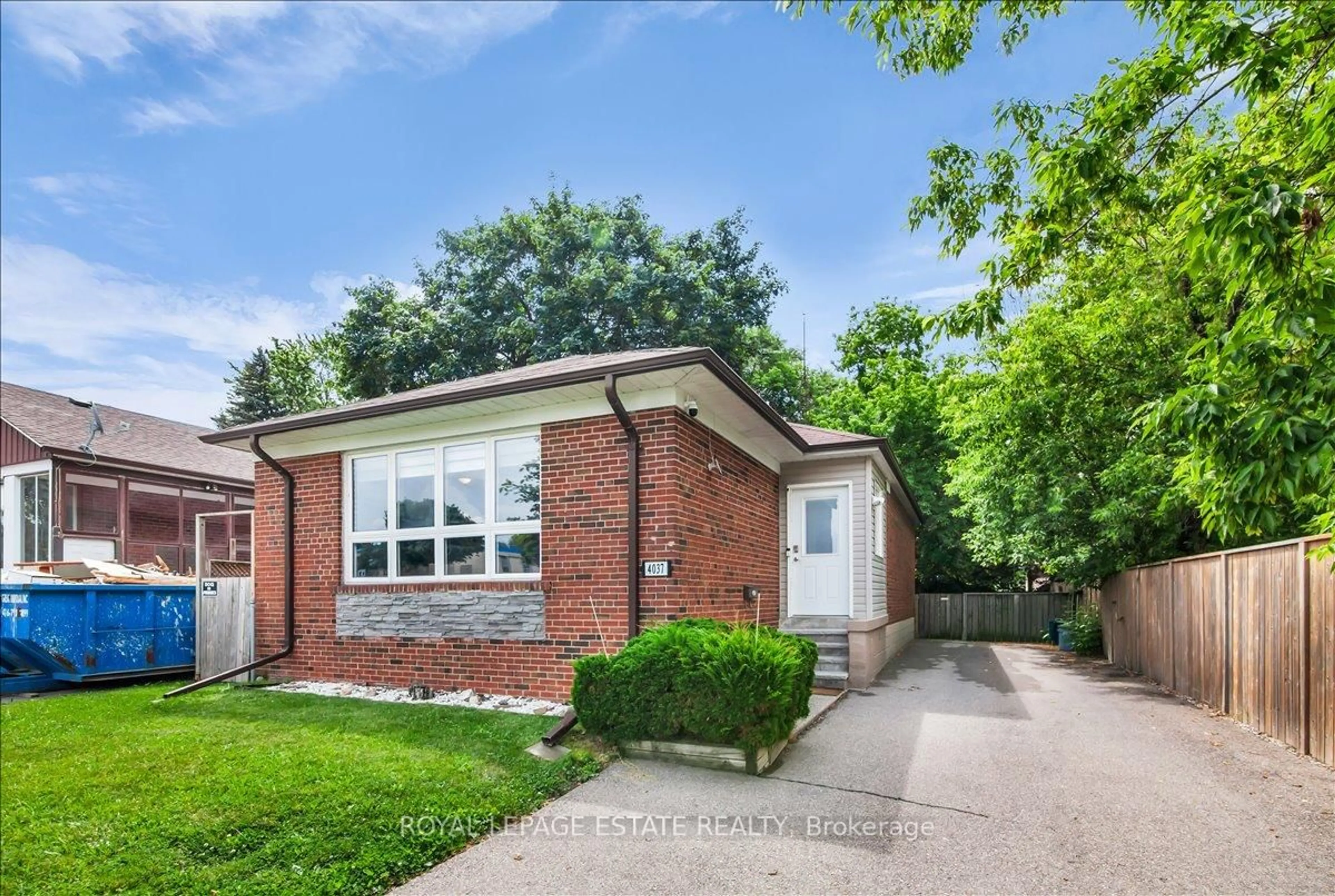 Home with brick exterior material, street for 4037 Bloor St, Toronto Ontario M9B 1M4
