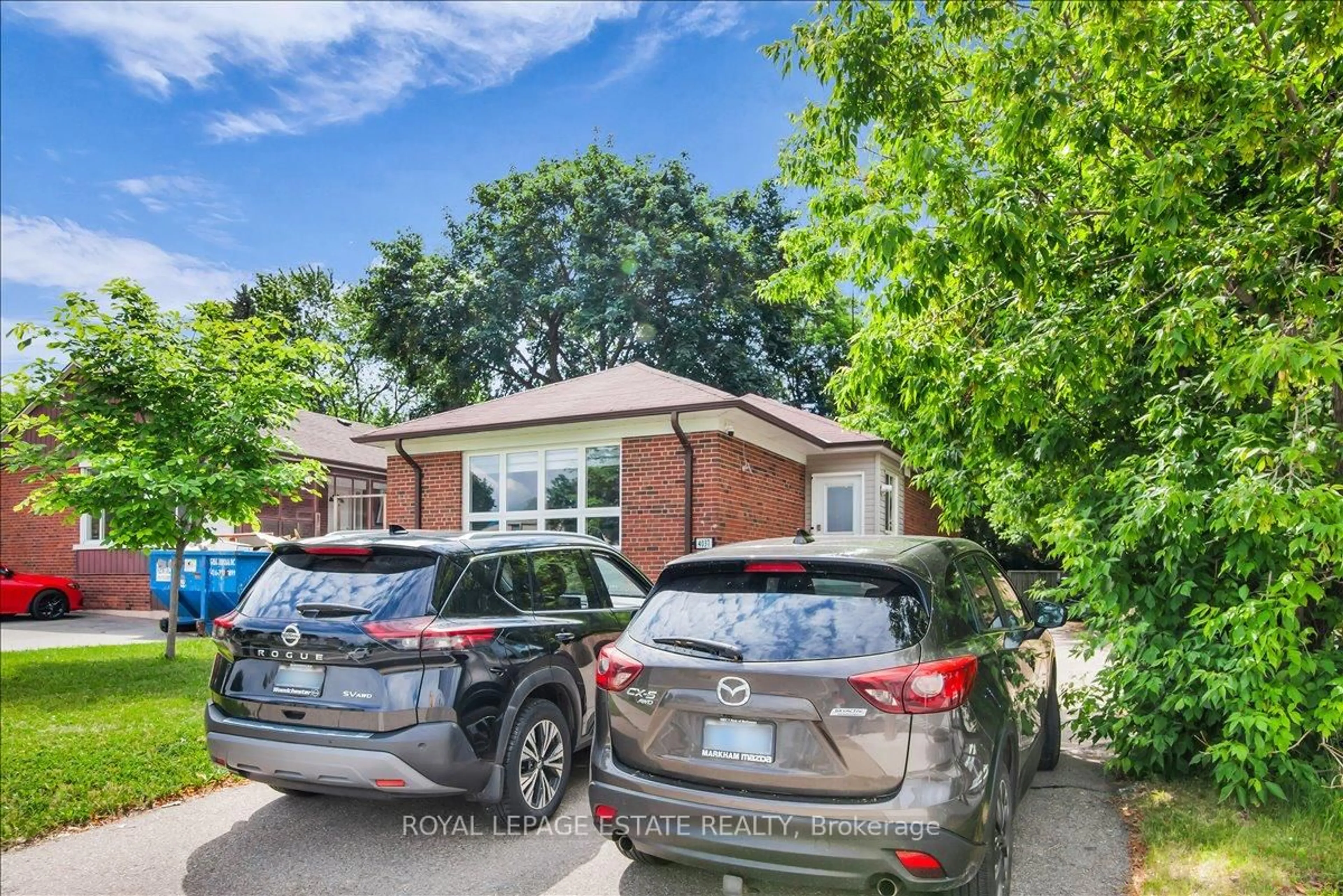 Home with brick exterior material, street for 4037 Bloor St, Toronto Ontario M9B 1M4