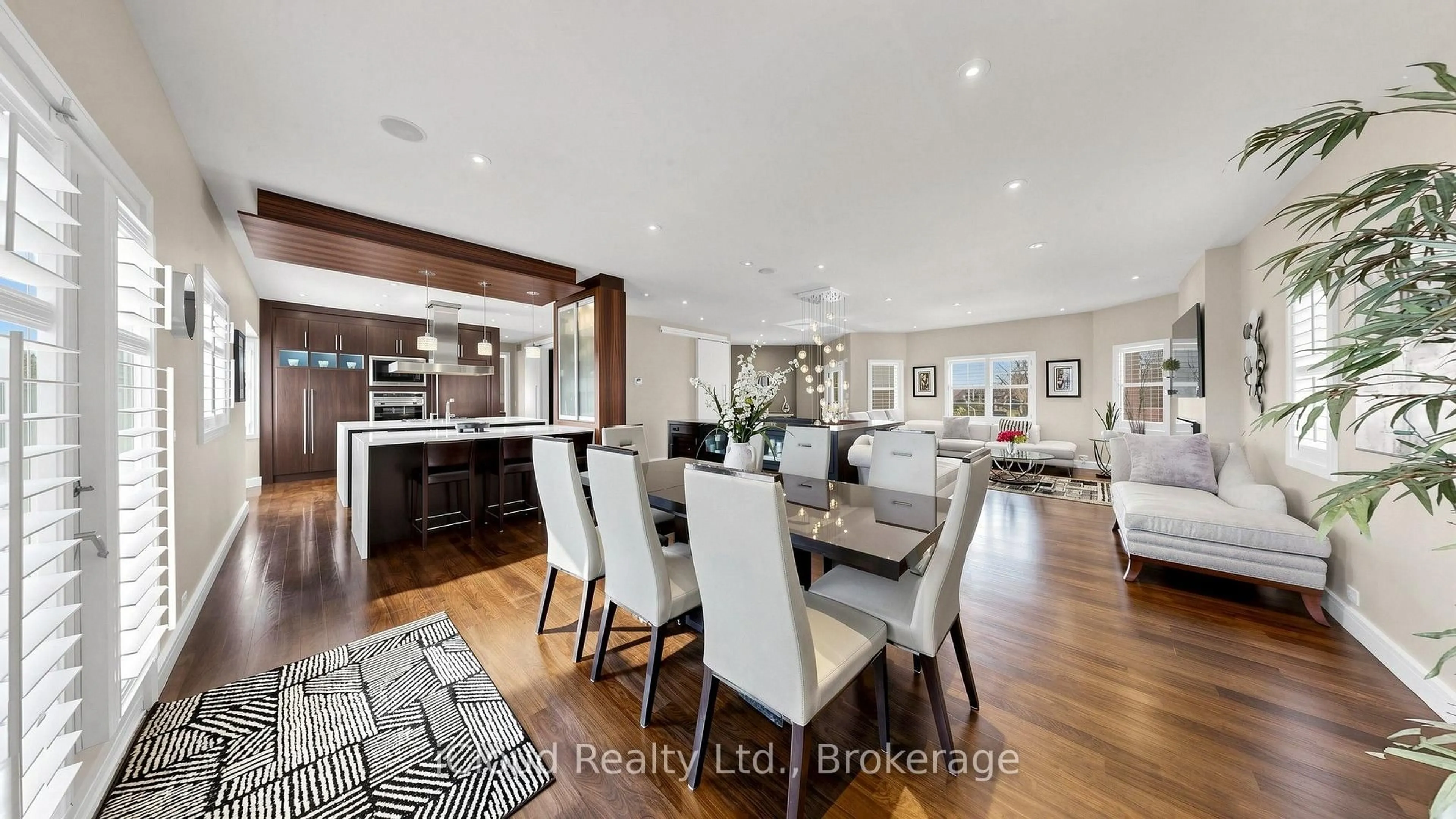 Open concept kitchen, wood/laminate floor for 30 Orchard Park Gate, Brampton Ontario L6R 1W5