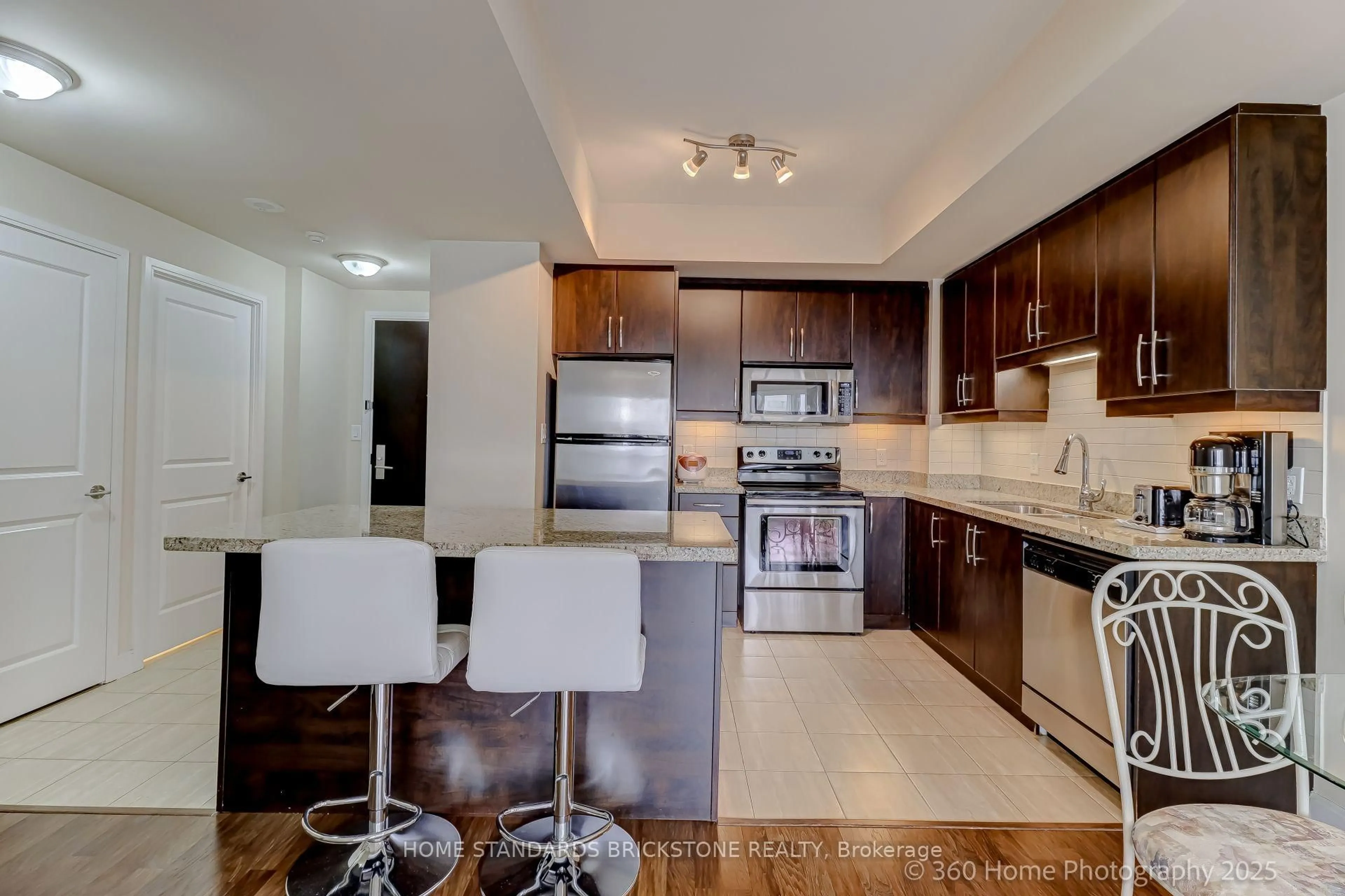 Open concept kitchen, ceramic/tile floor for 50 Absolute Ave #1106, Mississauga Ontario L4Z 0A8