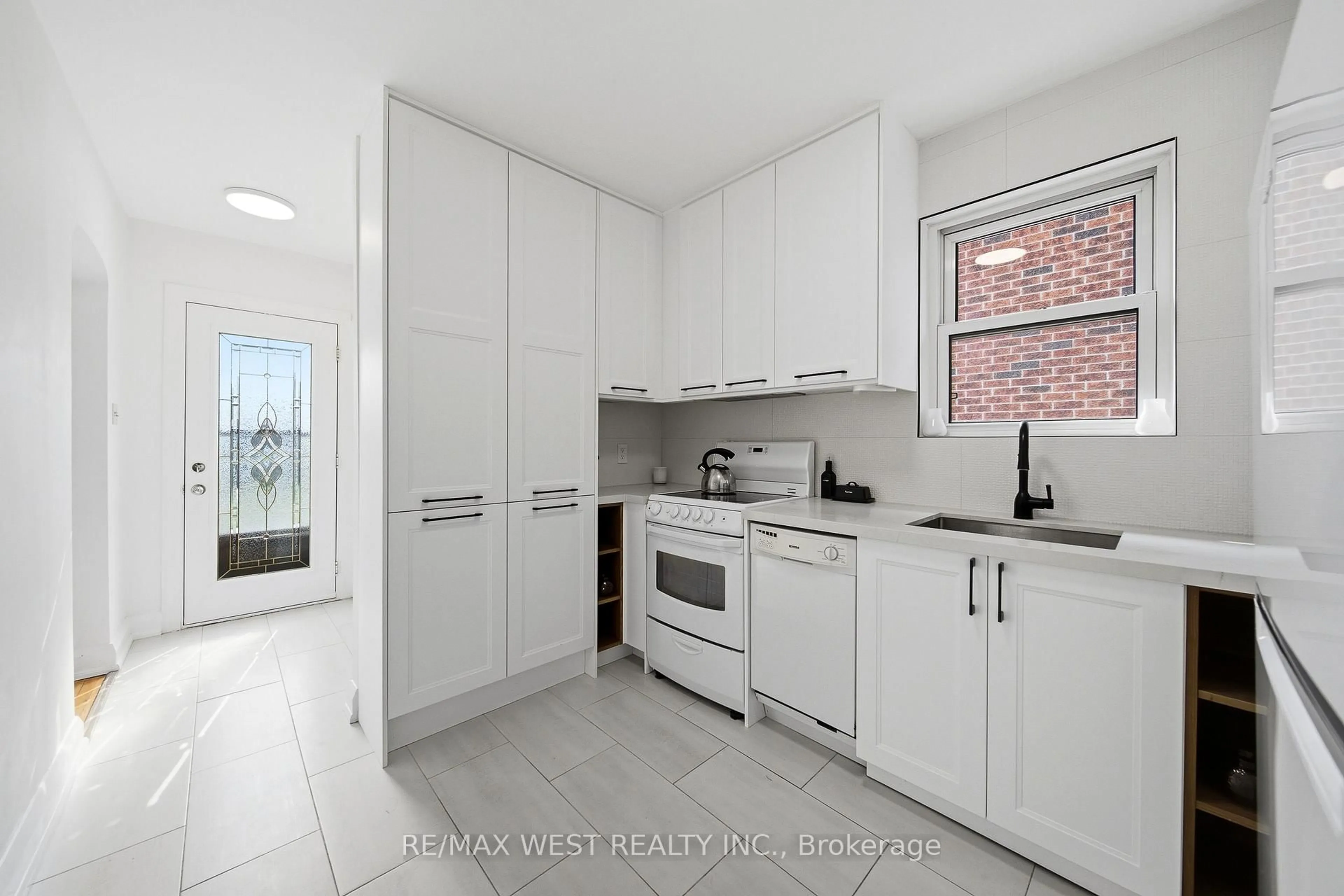 Standard kitchen, ceramic/tile floor for 28 Aldgate Ave, Toronto Ontario M8Y 3L6