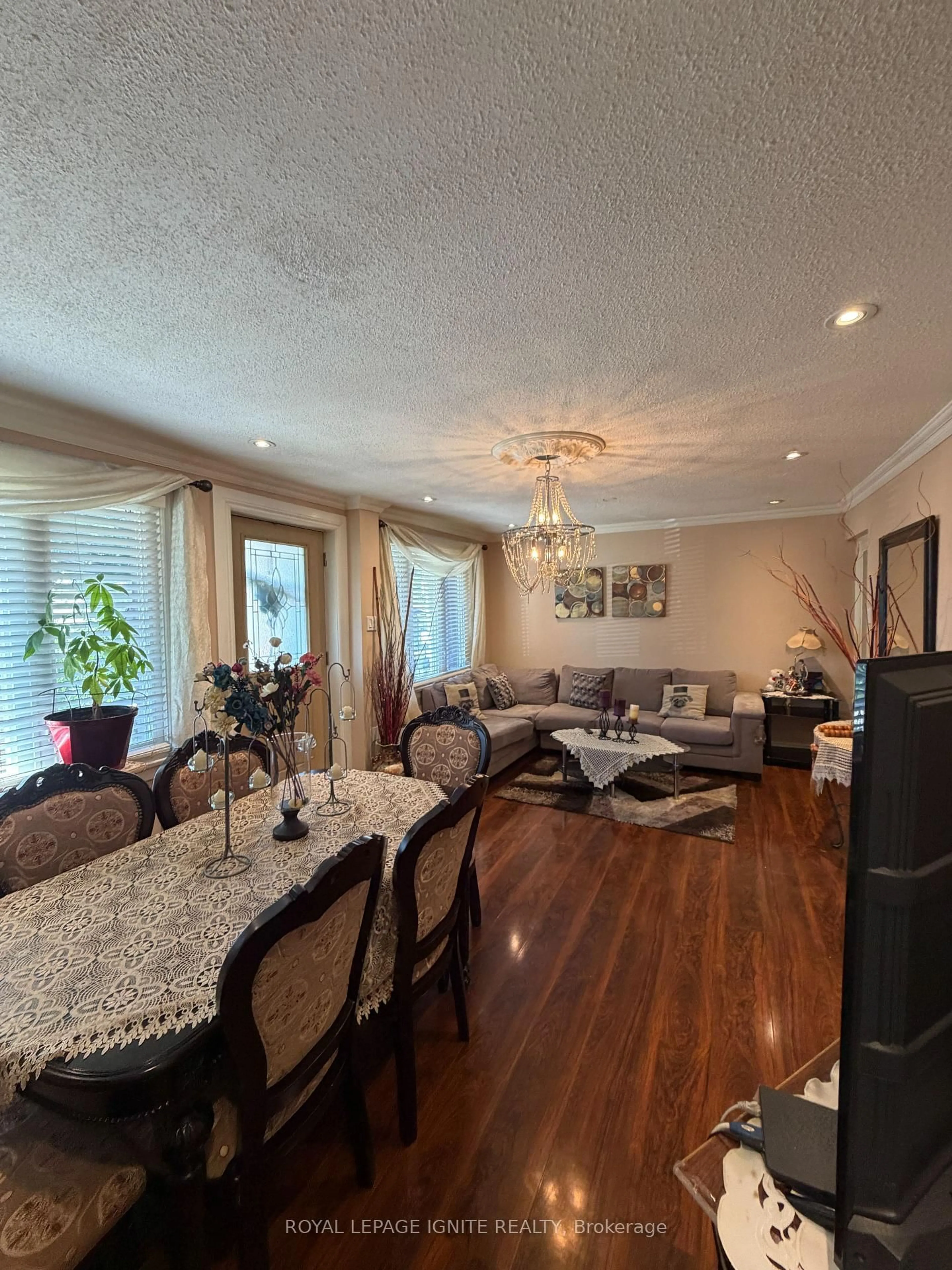 Living room with furniture, wood/laminate floor for 35 Hillary Ave, Toronto Ontario M6N 2B9