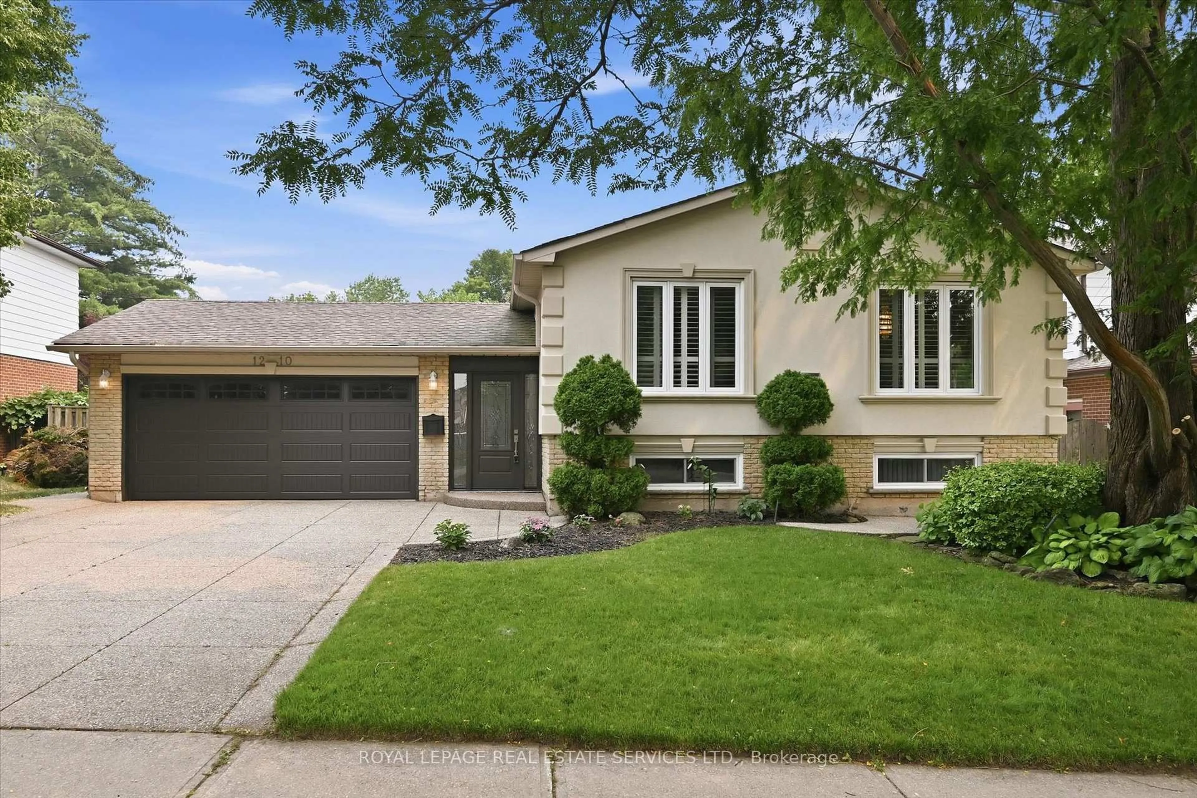 Home with brick exterior material, street for 1210 Grand Blvd, Oakville Ontario L6H 2X5