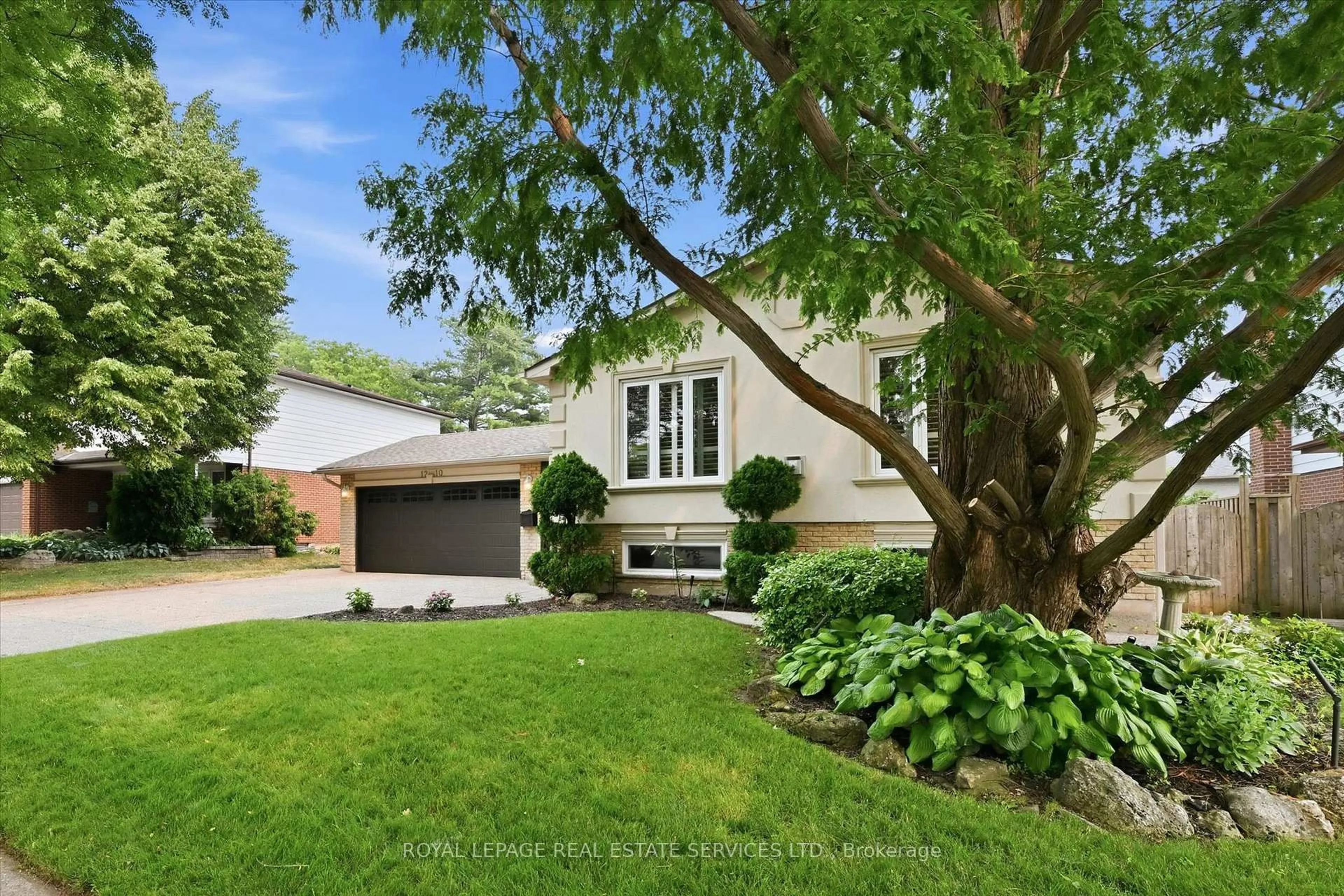 Home with brick exterior material, street for 1210 Grand Blvd, Oakville Ontario L6H 2X5