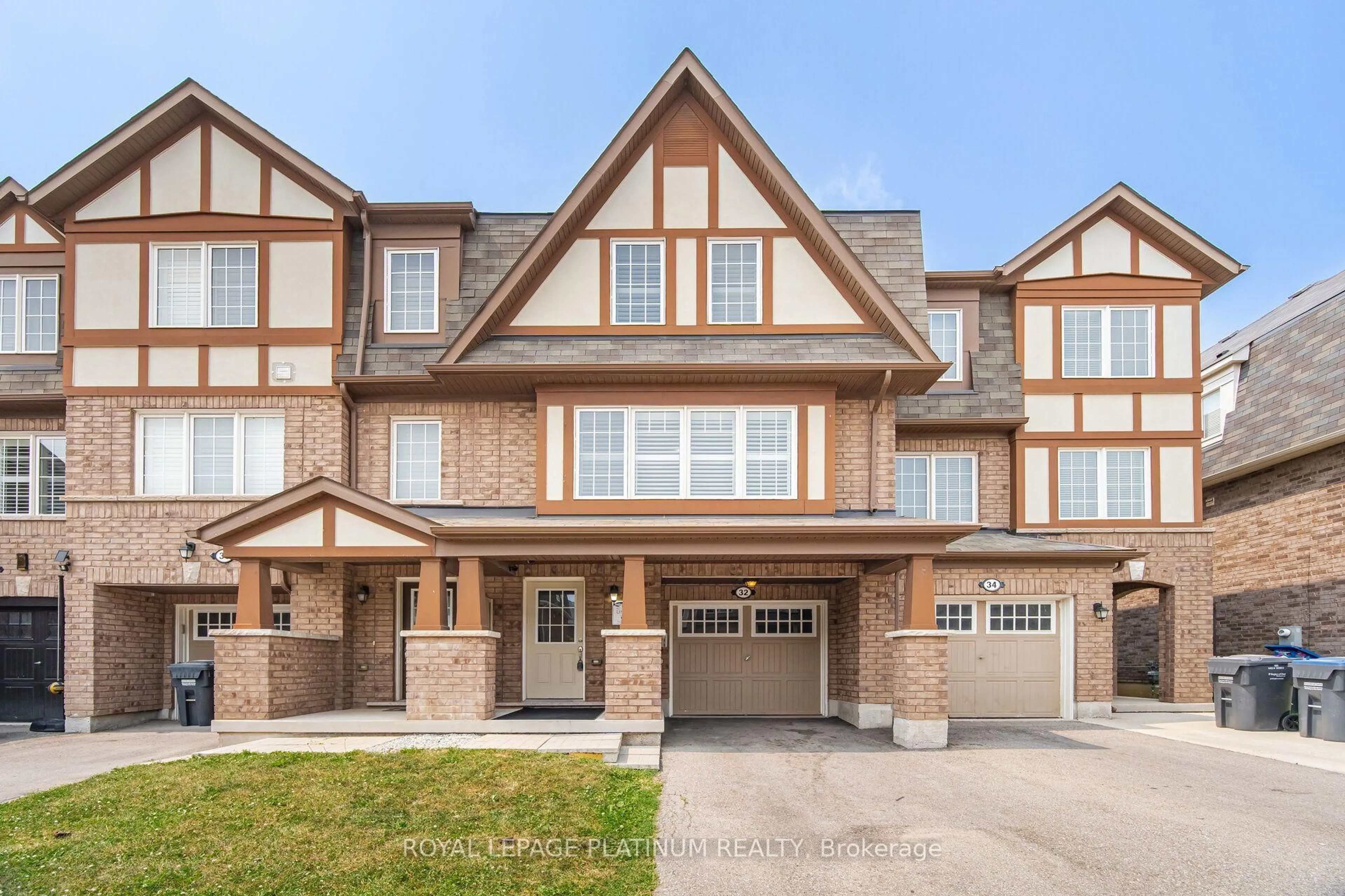 Home with brick exterior material, street for 32 Stewardship Rd, Brampton Ontario L7A 4E8