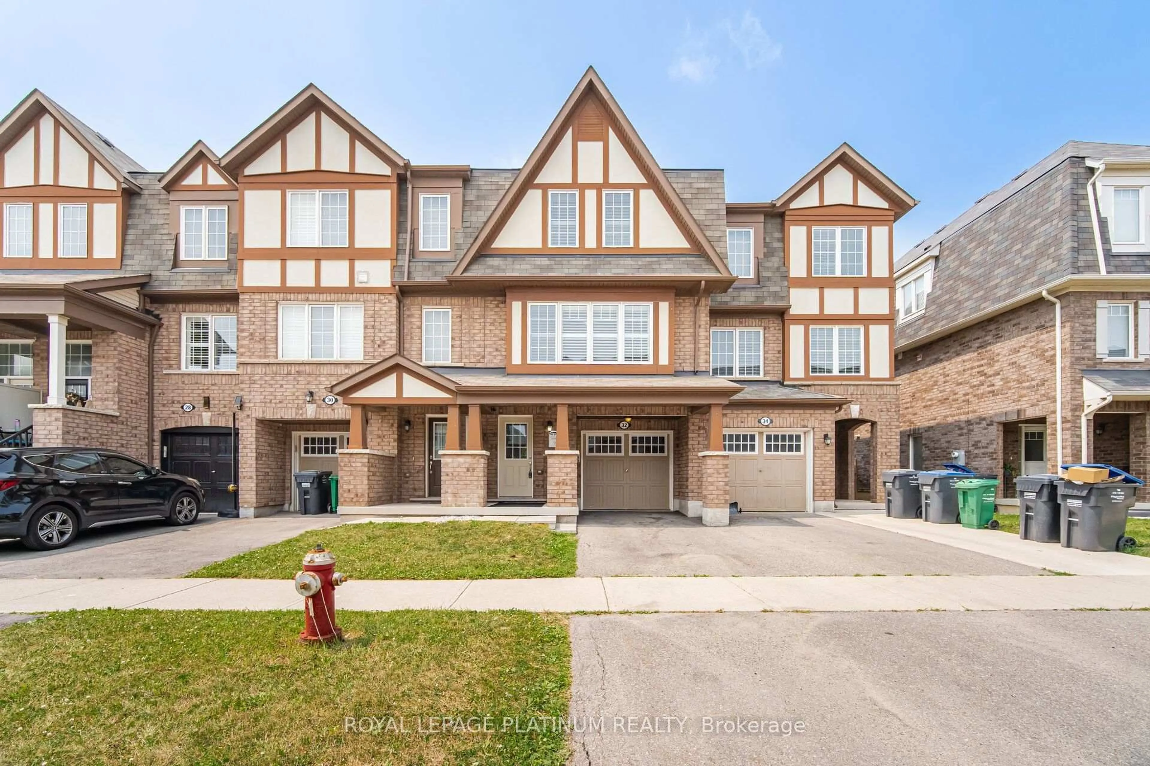 Home with brick exterior material, street for 32 Stewardship Rd, Brampton Ontario L7A 4E8