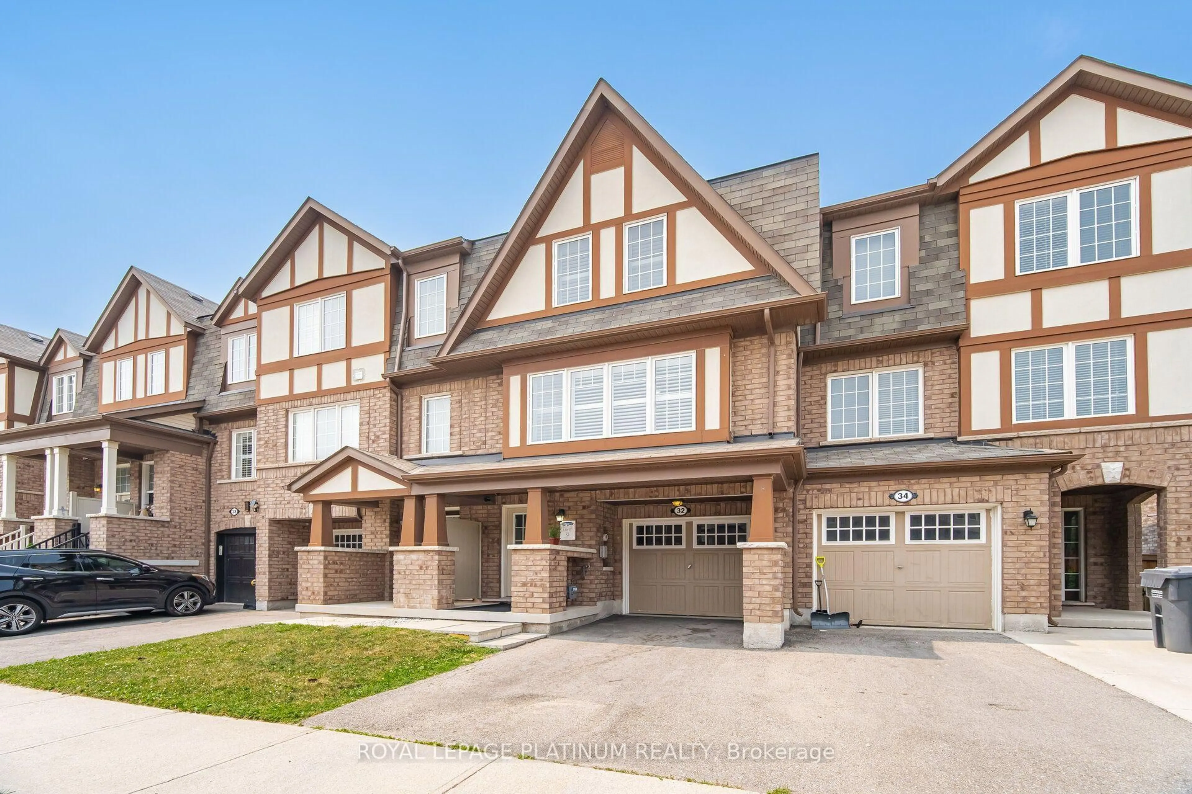 Home with brick exterior material, street for 32 Stewardship Rd, Brampton Ontario L7A 4E8